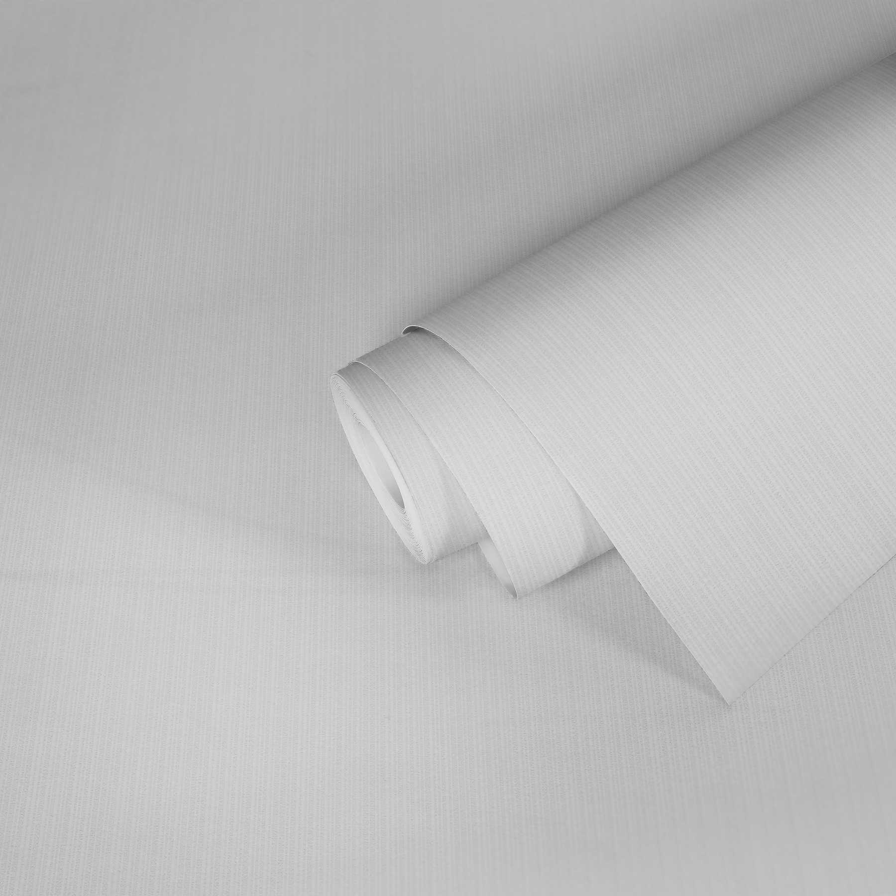             Papier peint intissé Pigment uni blanc avec motifs structurés
        