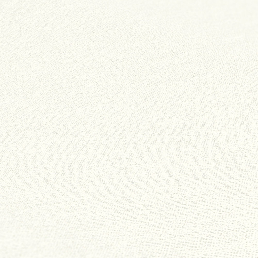             Eenheidsbehang crème-wit van MICHASLKY met textielstructuur
        