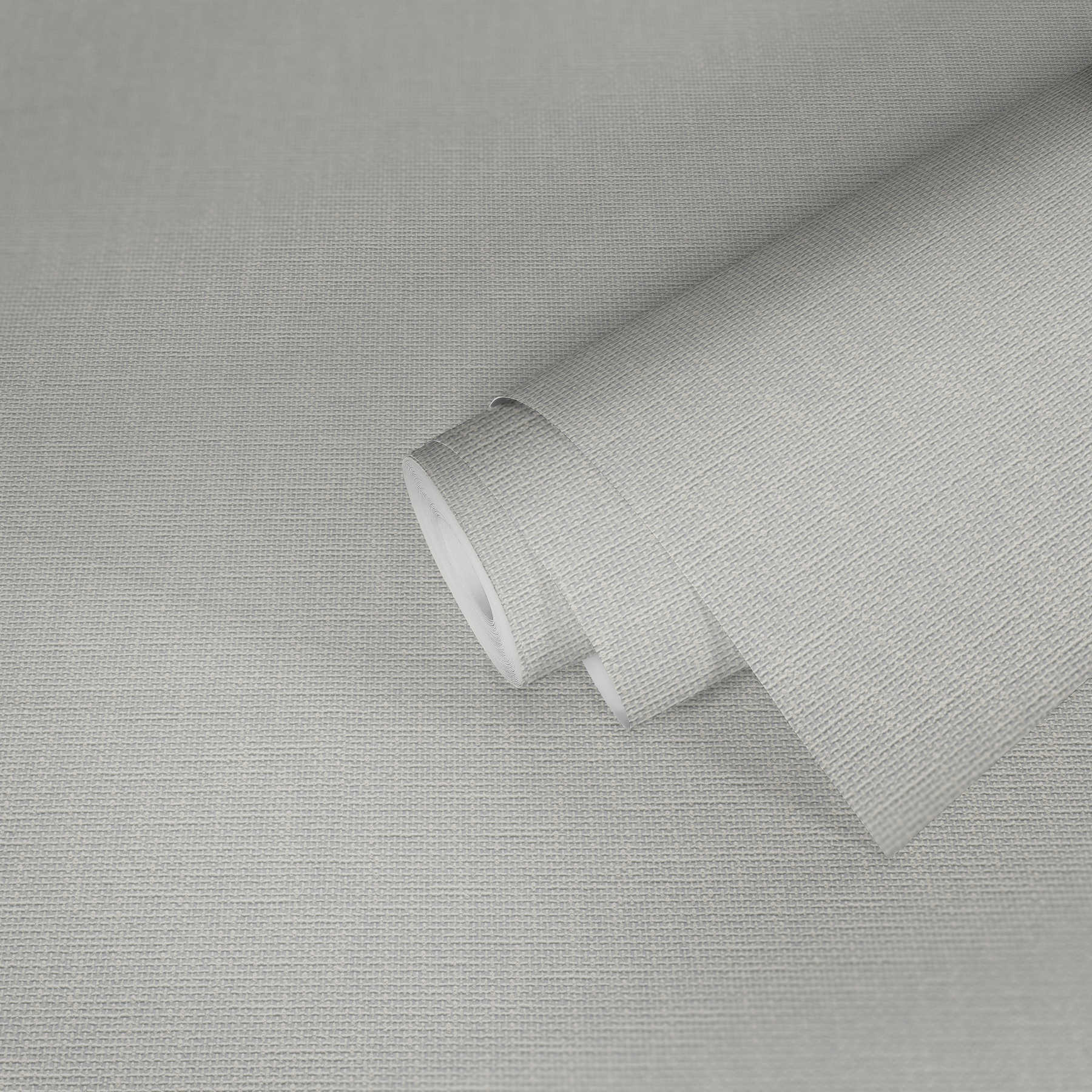             Papier peint avec structure tissée et aspect textile - blanc
        