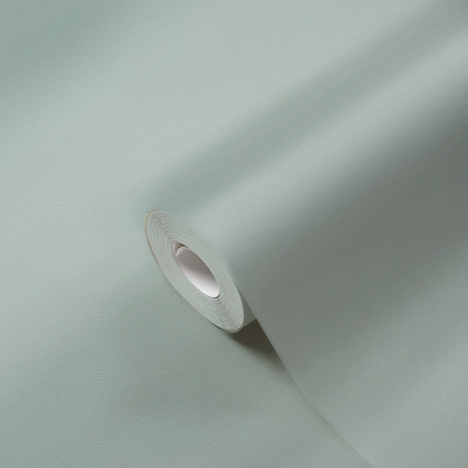             Papier peint uni à texture discrète aspect textile - vert
        