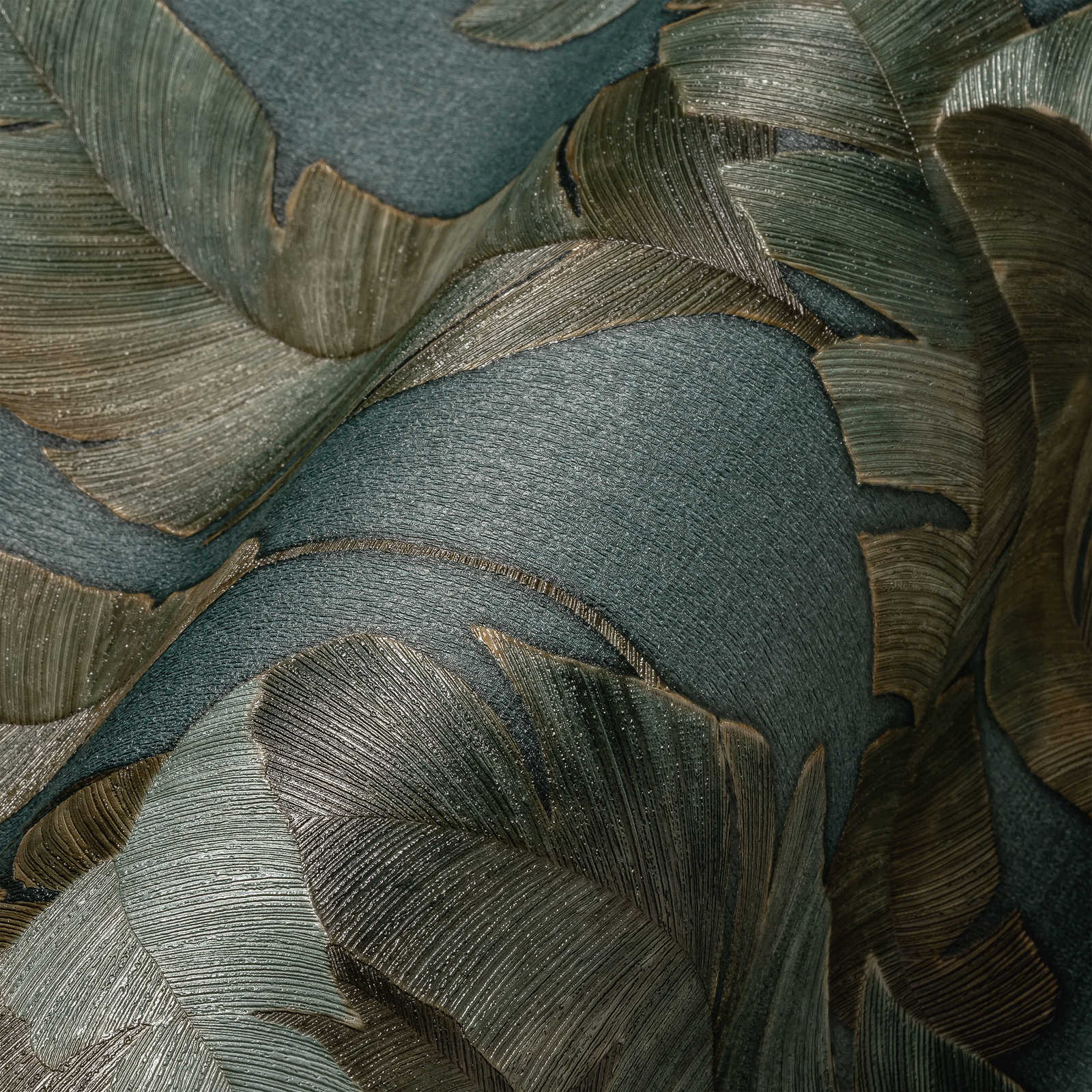             Carta da parati in tessuto non tessuto con grandi foglie di palma in colore scuro - petrolio, verde, marrone
        