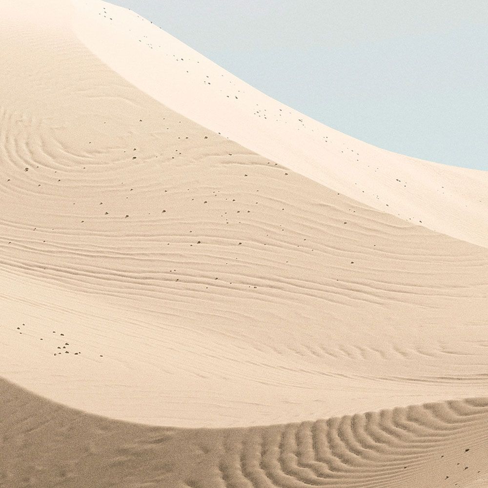             Photo wallpaper »dunes« - pastel-coloured desert landscape - Smooth, slightly pearlescent non-woven fabric
        