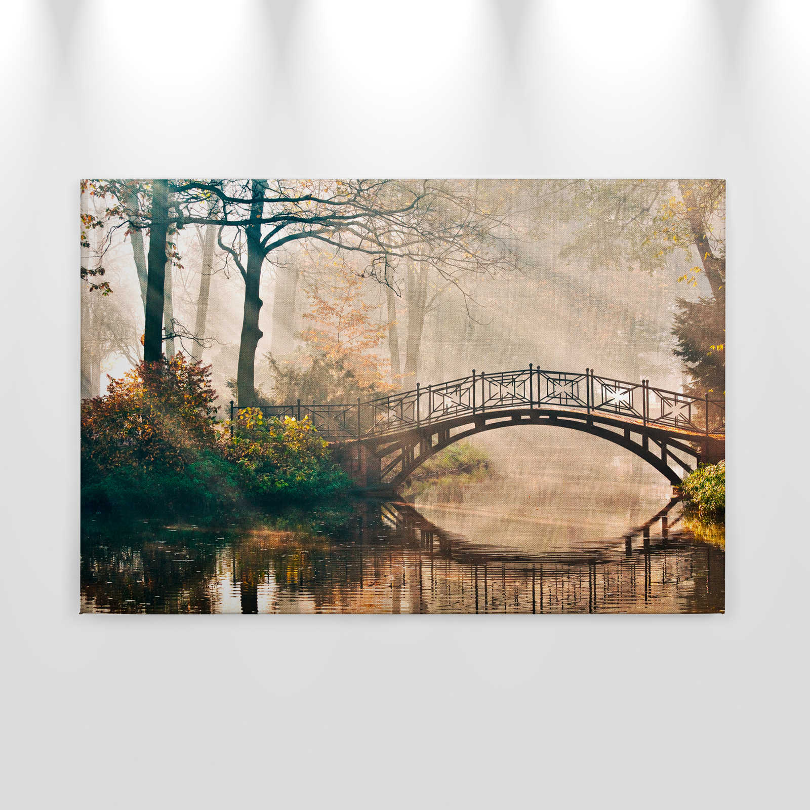             Canvas met brug over een rivier in een loofbos - 0.90 m x 0.60 m
        
