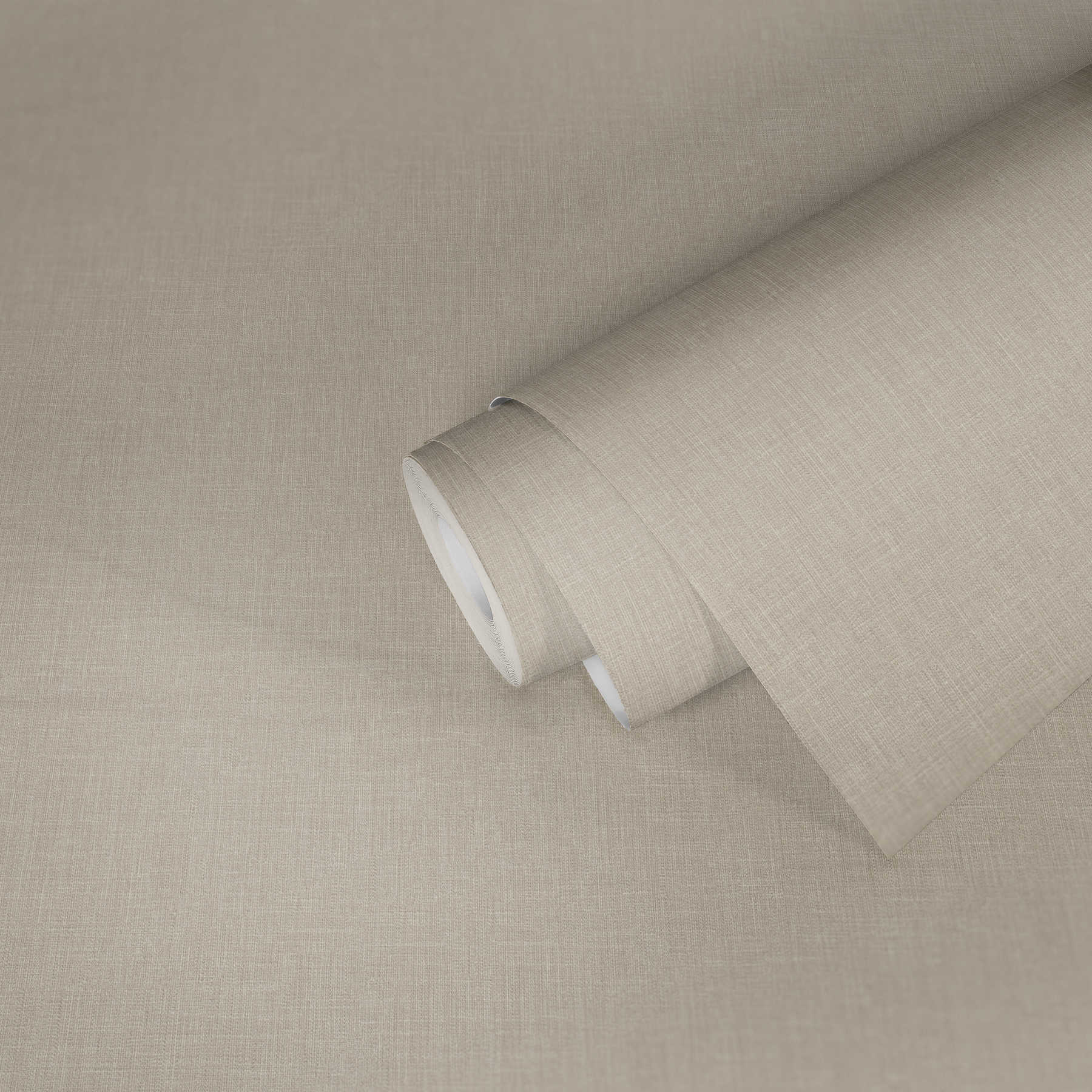             Papier peint intissé beige chiné aspect lin & structure textile
        