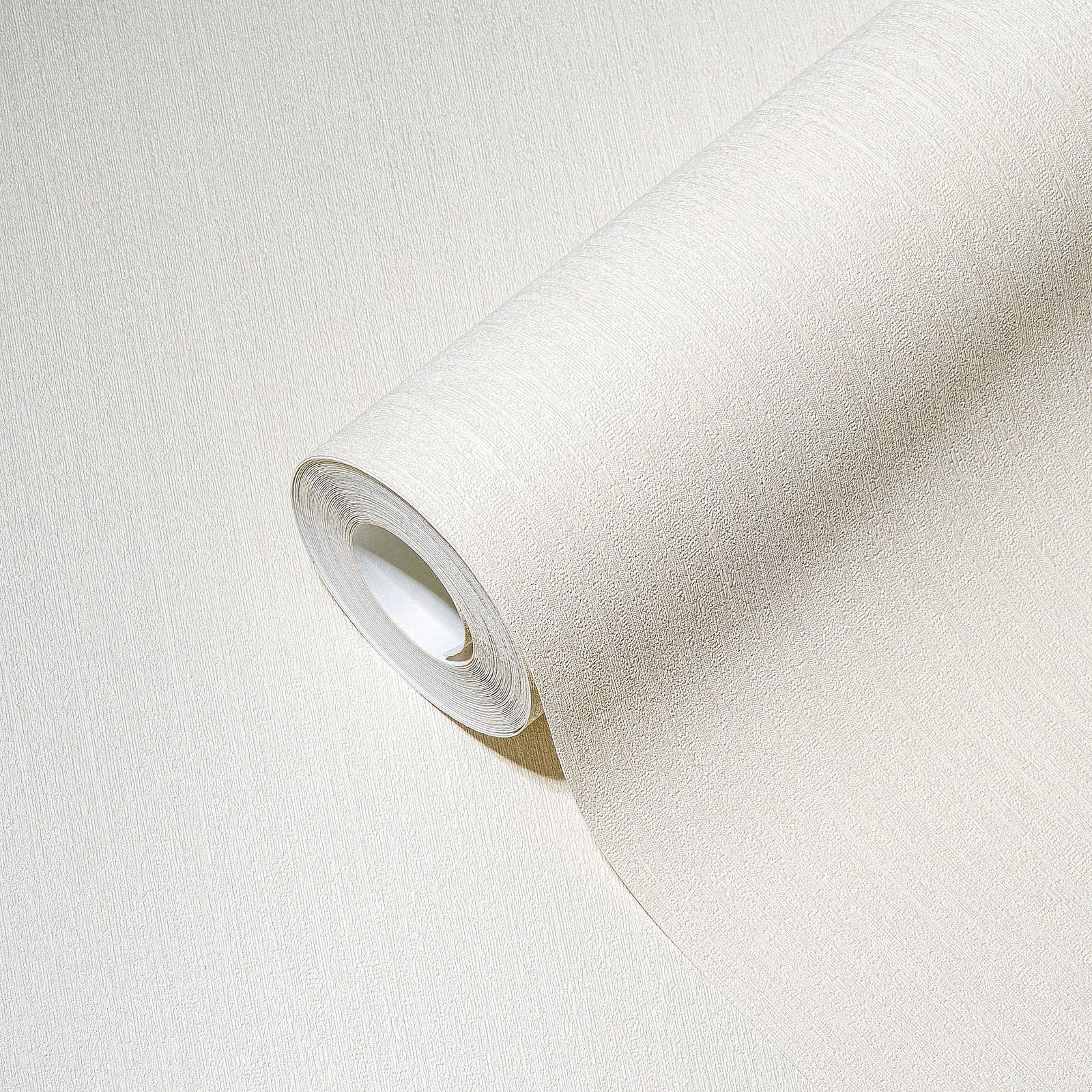             Papier peint blanc métallisé avec effet texturé naturel
        