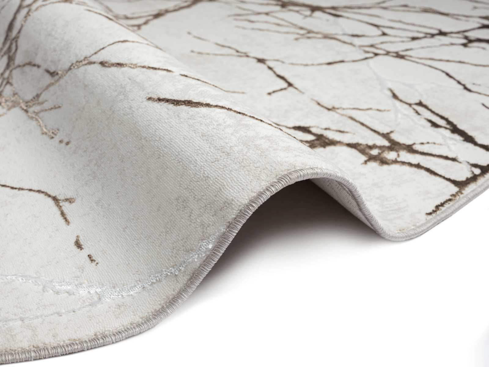             Pluizig hoogpolig tapijt in crème - 170 x 120 cm
        