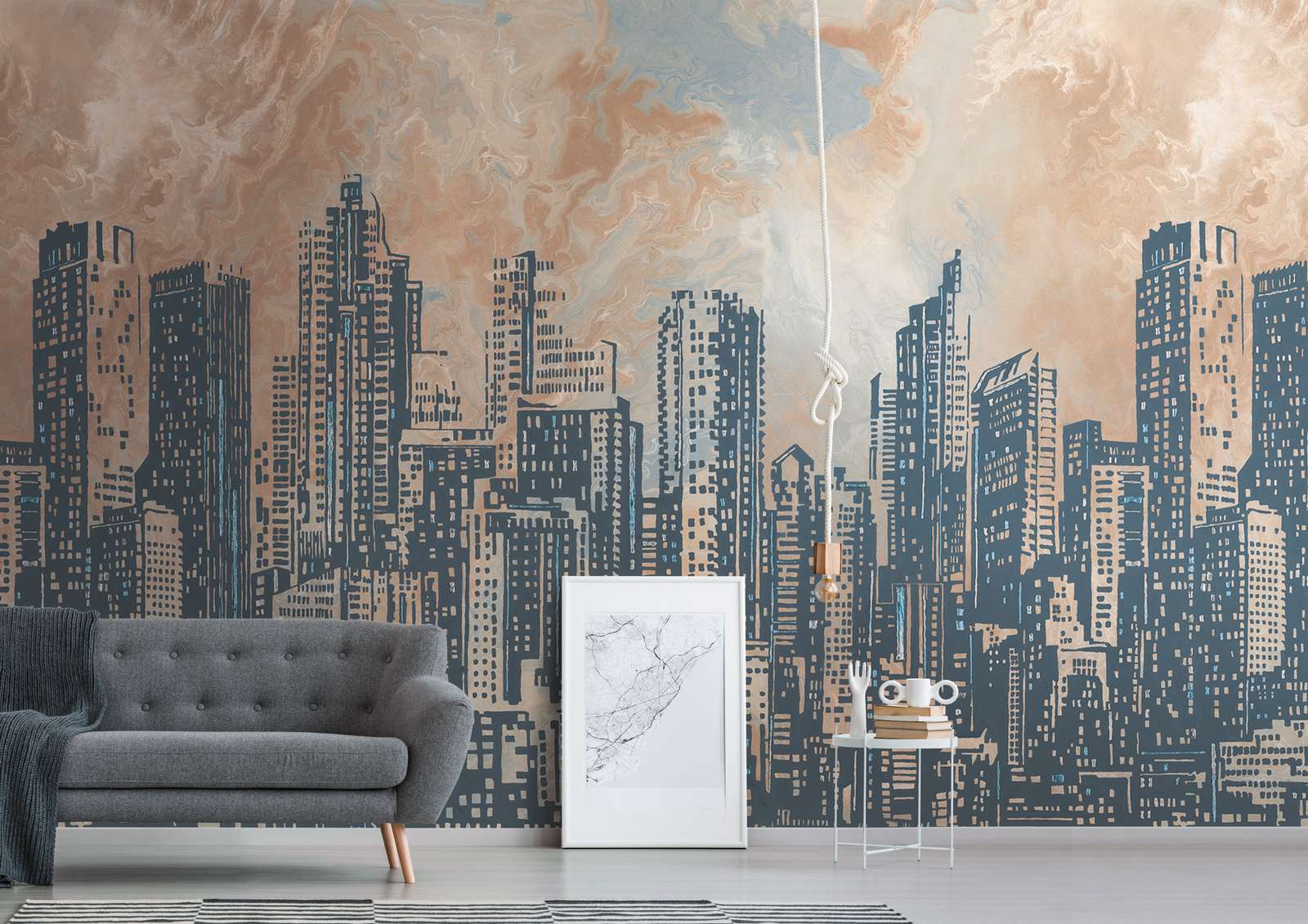             Papier peint intissé Skyline de la ville au crépuscule - orange, gris, bleu
        