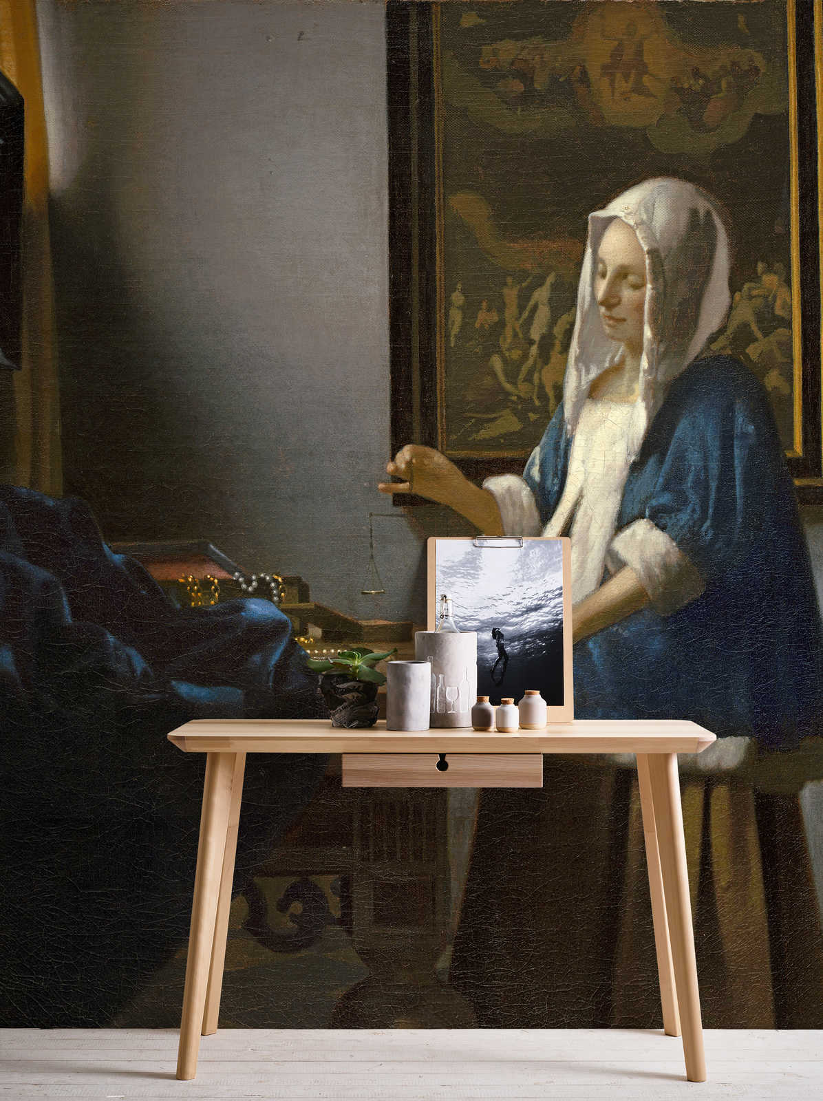             Muurschildering "Vrouw met weegschaal" van Jan Vermeer
        