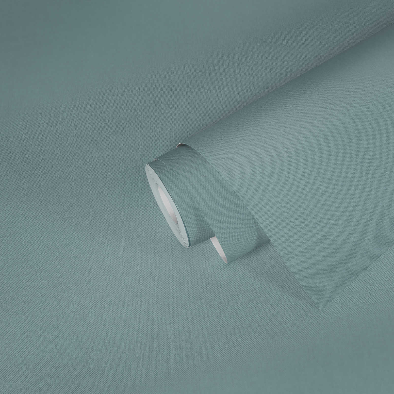             Papier peint vert sauge uni & mat avec structure textile - vert
        