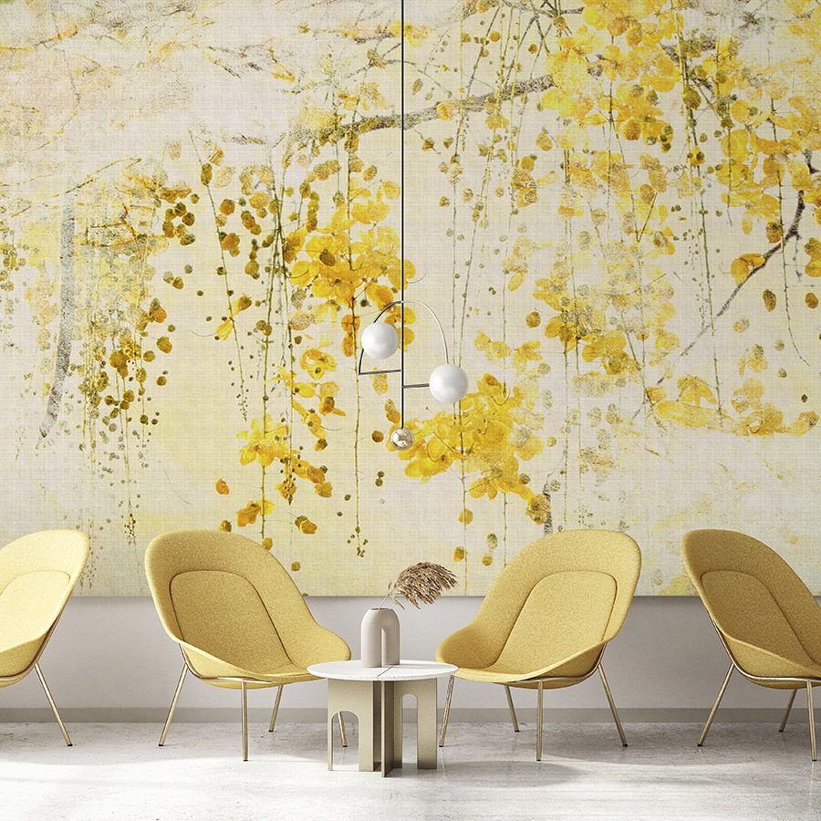 Photo wallpaper »taiyo« - Flower garland with linen structure in the background - Yellow | Smooth, slightly shiny premium non-woven fabric
