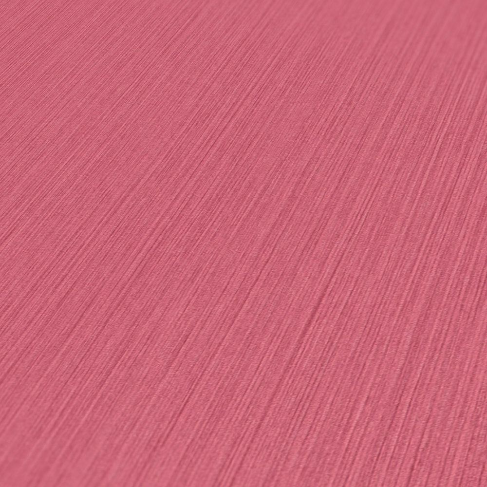             Papier peint rose avec effet textile chiné de MICHALSKY
        