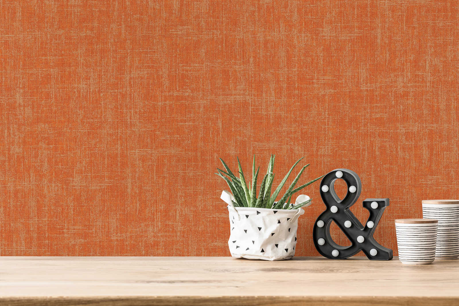             Orange wallpaper with linen texture design
        
