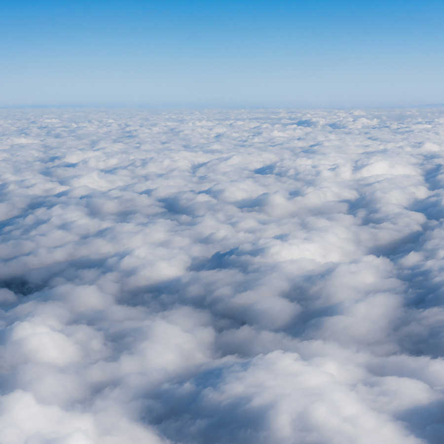 Carta da parati natura Sopra le nuvole su tessuto non tessuto liscio opaco
