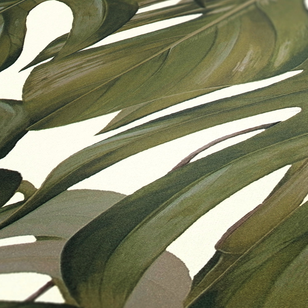             Papel pintado no tejido con motivo de hojas de Monstera - gris, verde, blanco
        