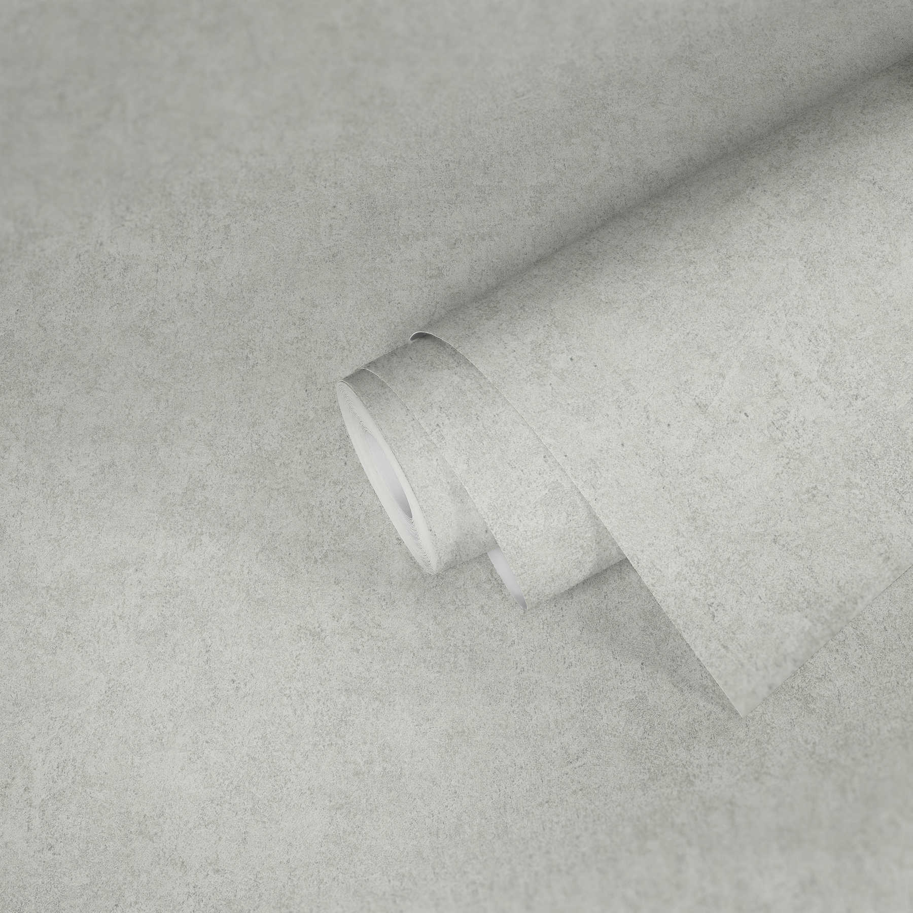             aspect plâtre papier peint beige gris chiné avec gaufrage structuré
        