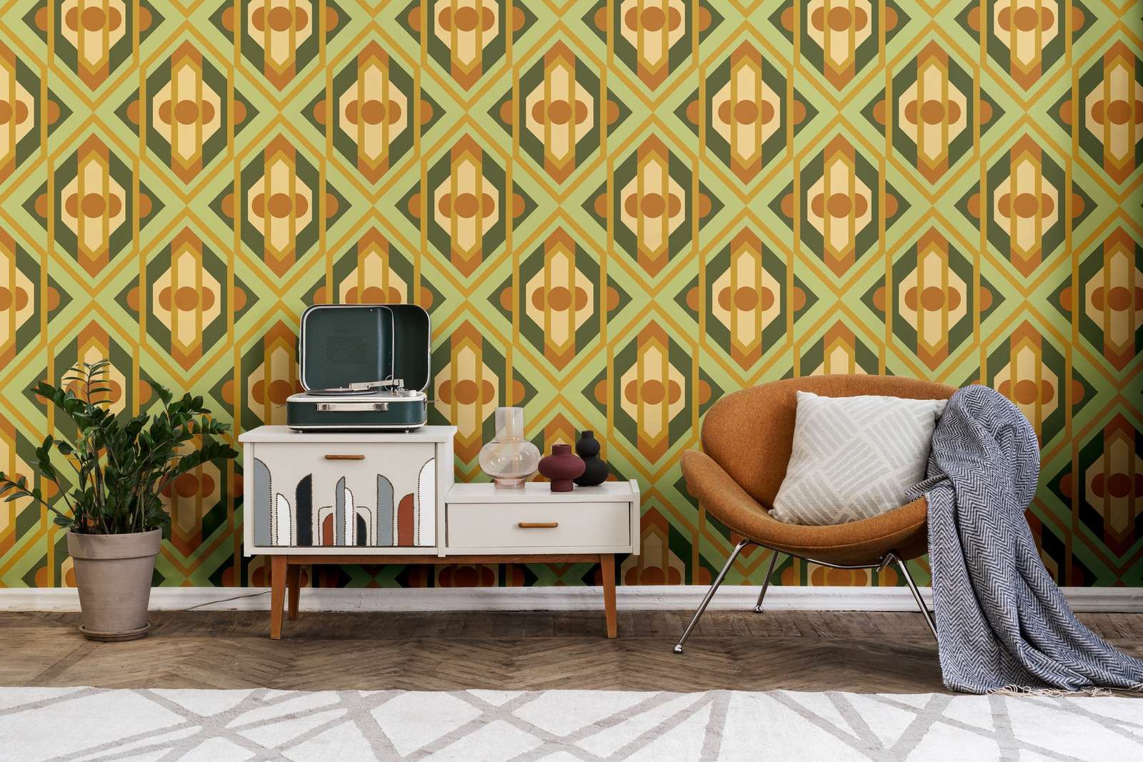             Geometric ornaments in retro style on non-woven wallpaper - green, yellow, orange
        