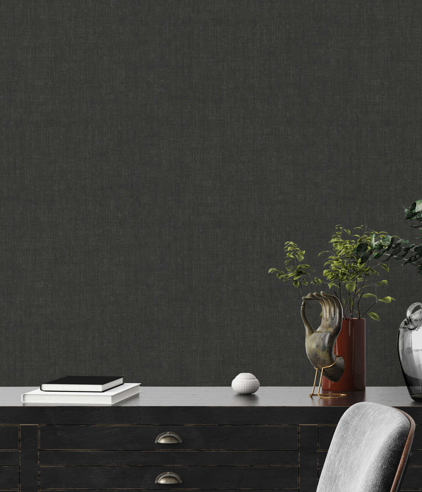             Black non-woven wallpaper with mellow textile pattern
        