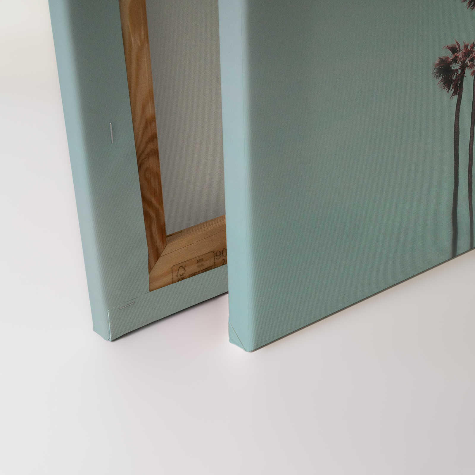             Tableau toile Palmiers & ciel pour une ambiance de plage en turquoise & rose - 1,20 m x 0,80 m
        