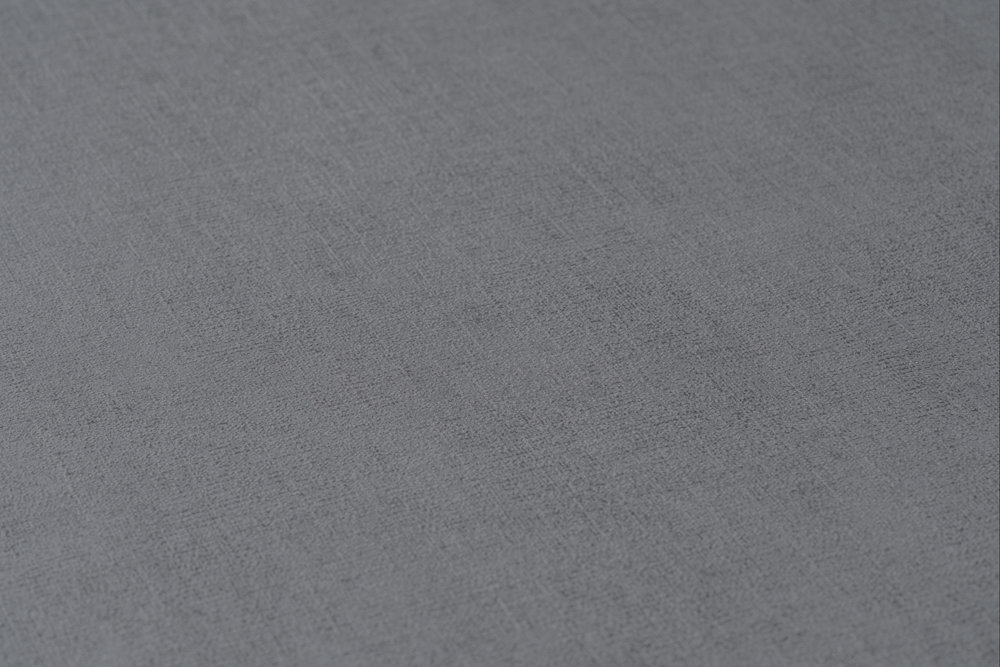             Papier peint uni gris foncé chiné avec effet chatoyant - gris
        