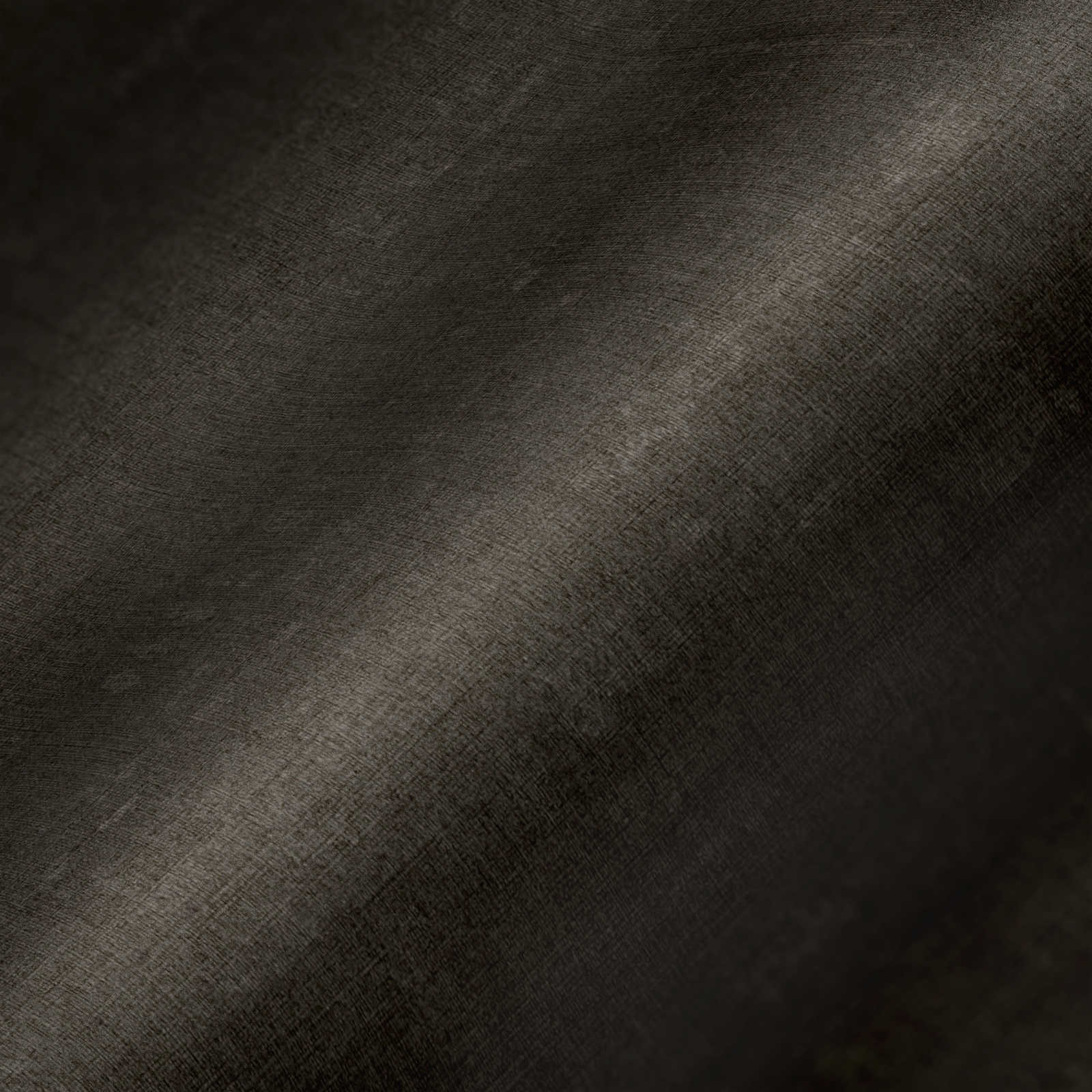             Papier peint marron uni et chiné avec gaufrage structuré
        