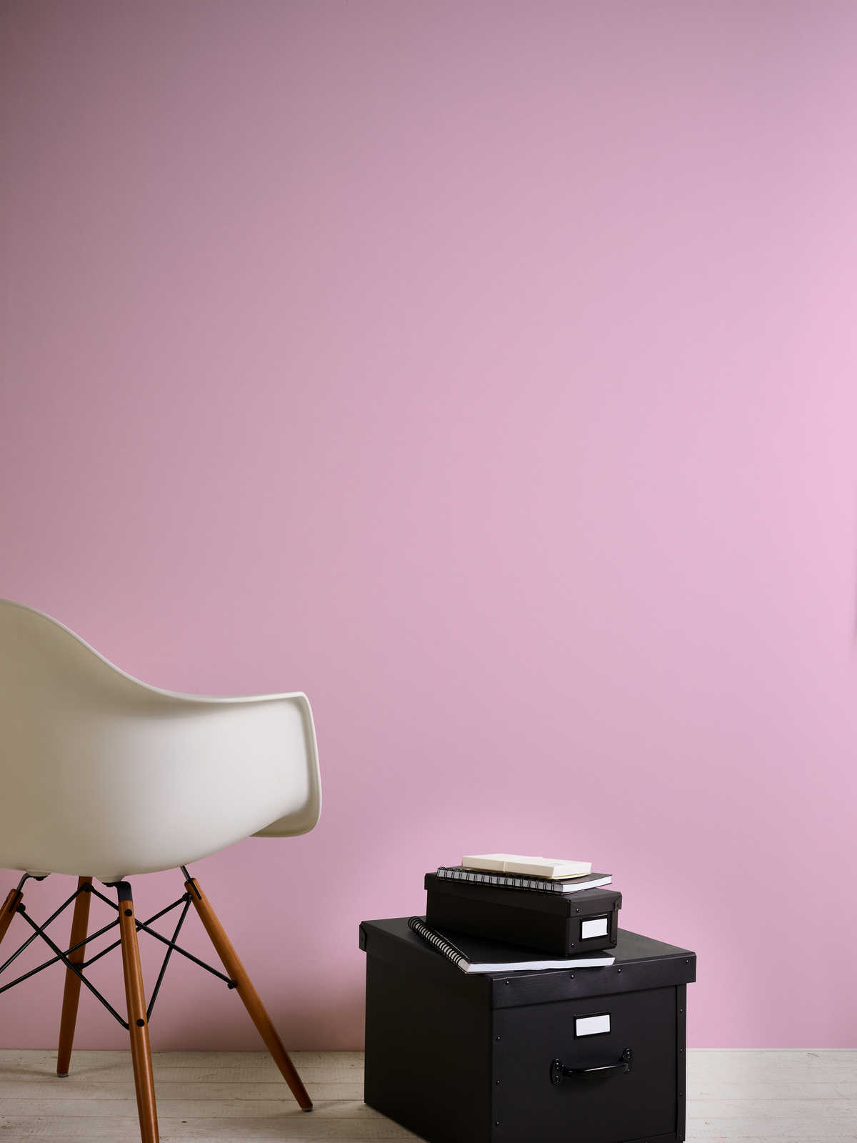             Pink non-woven wallpaper - matte with subtle textured pattern
        