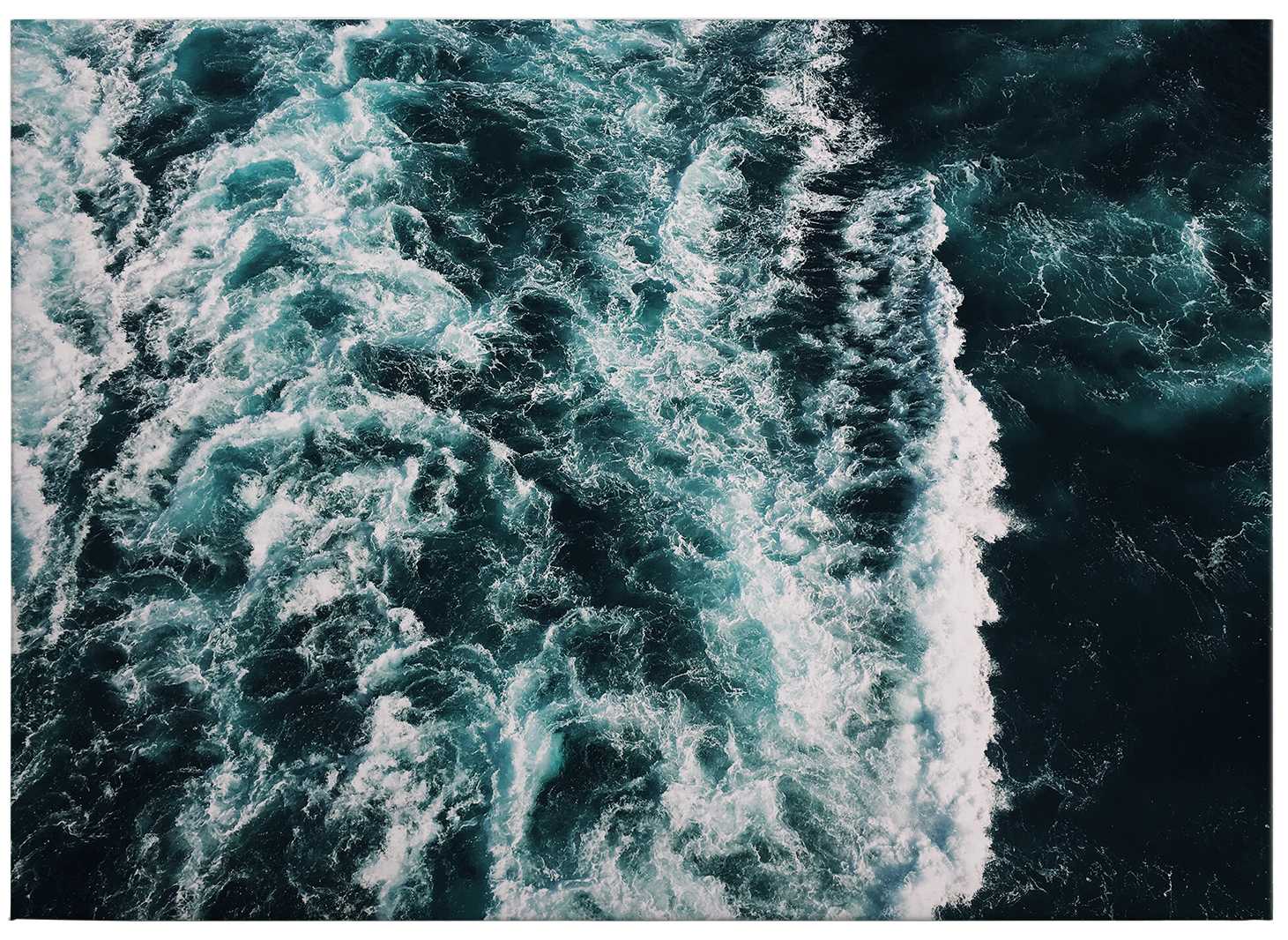             Blue sea canvas print with wave motif
        