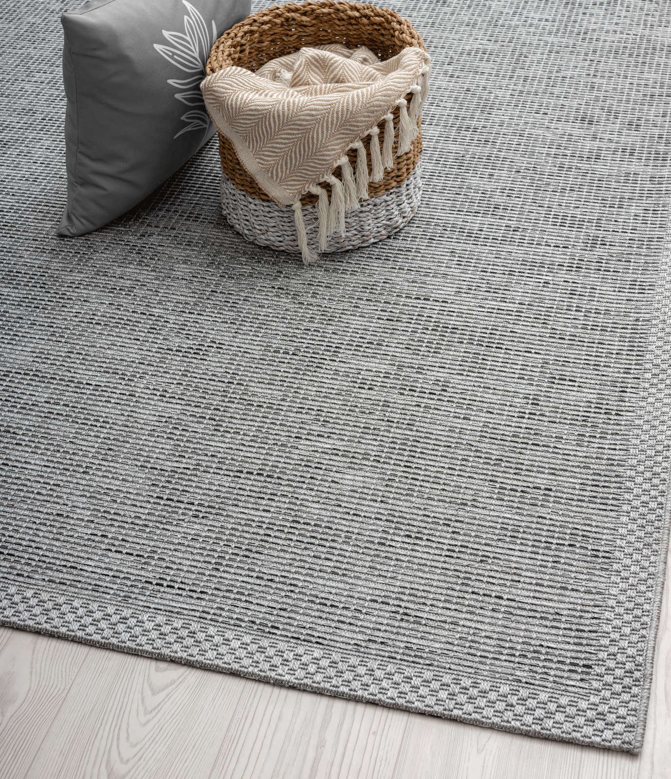             Eenvoudig vloerkleed voor buiten in grijs - 200 x 140 cm
        