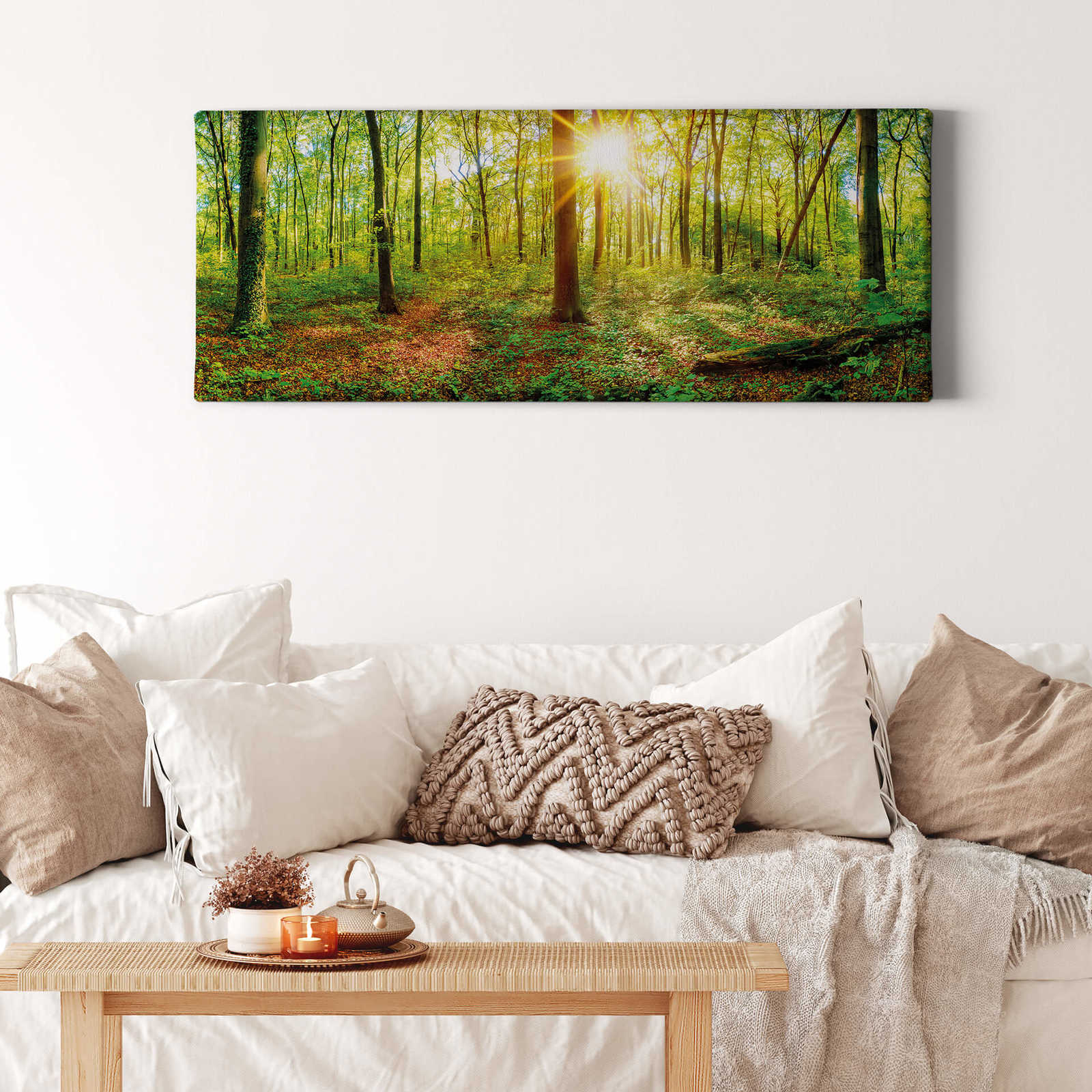             Canvas schilderij Midden in het bos met zon - 1,00 m x 0,40 m
        