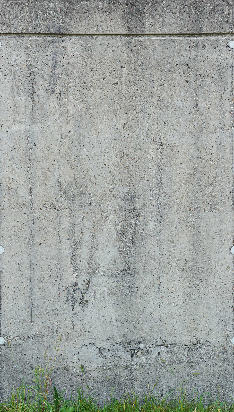             Onderlaag behang met stenen muur optiek en gras - grijs, groen
        