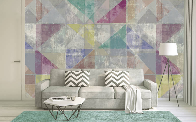             Used look triangle design mural - grey, blue, yellow
        