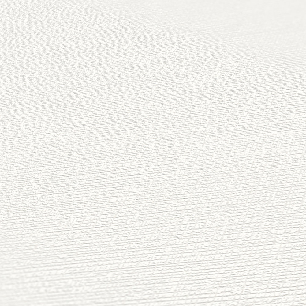             Papier peint intissé blanc avec structure rétro & effet textile
        
