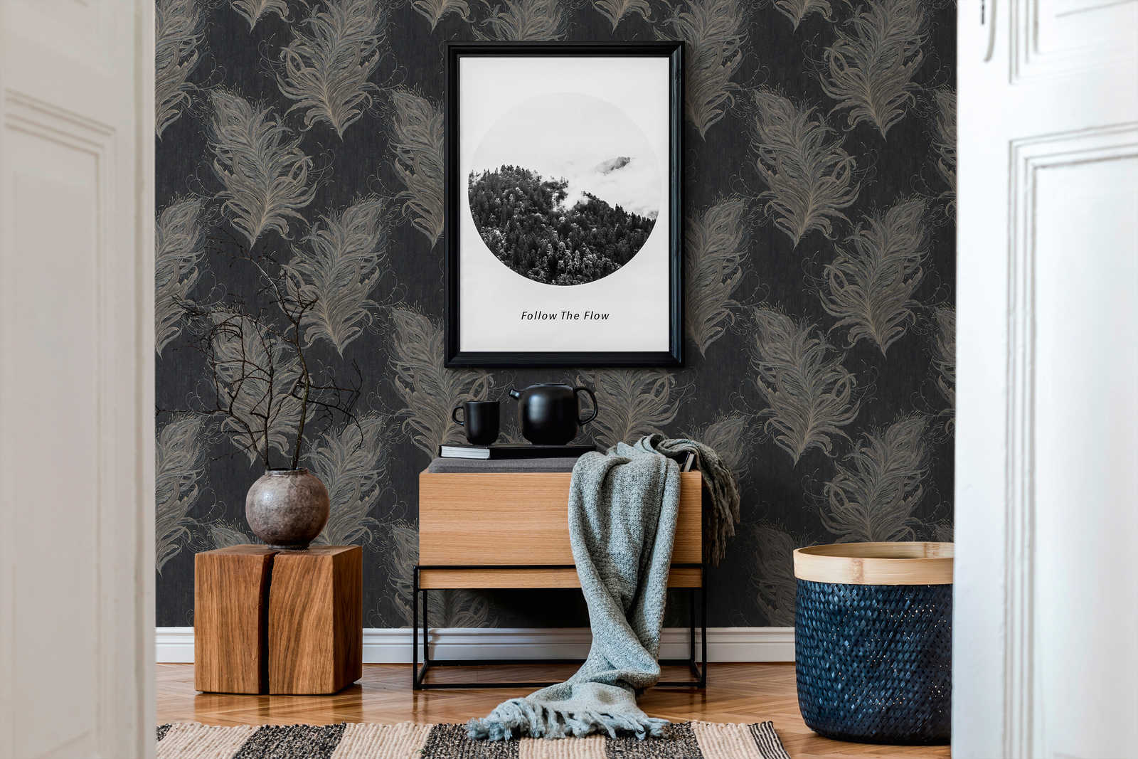             Black non-woven wallpaper with feathers in metallic colours
        