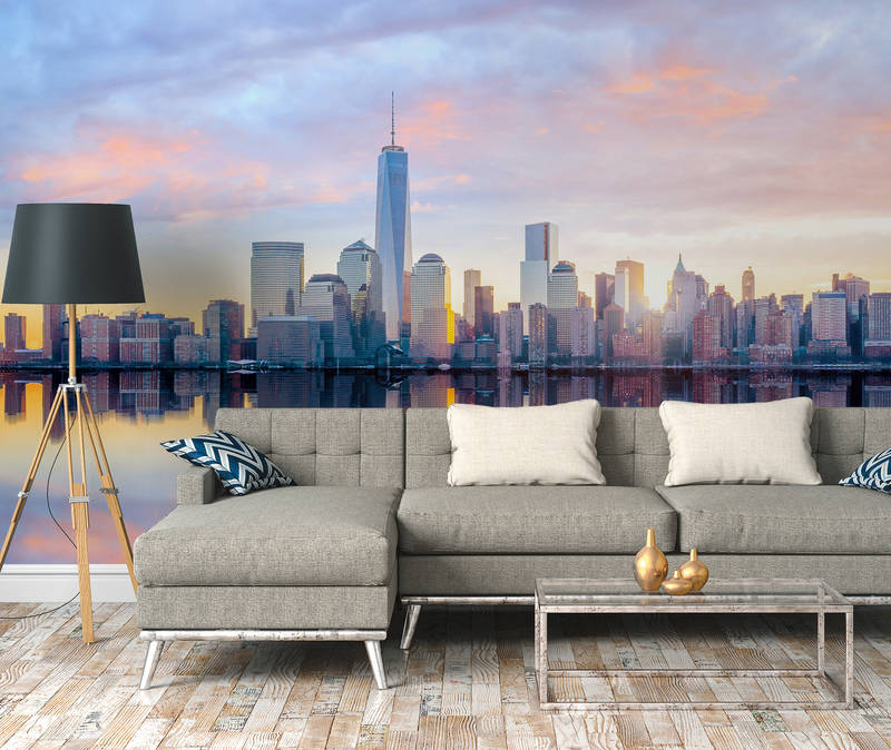             Photo wallpaper New York skyline in the morning - blue, grey, yellow
        