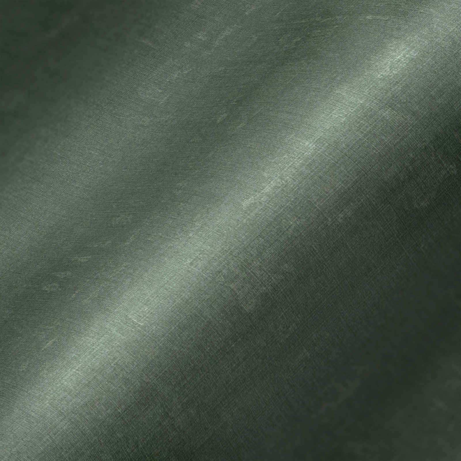             Papier peint vert uni et chiné avec gaufrage structuré
        