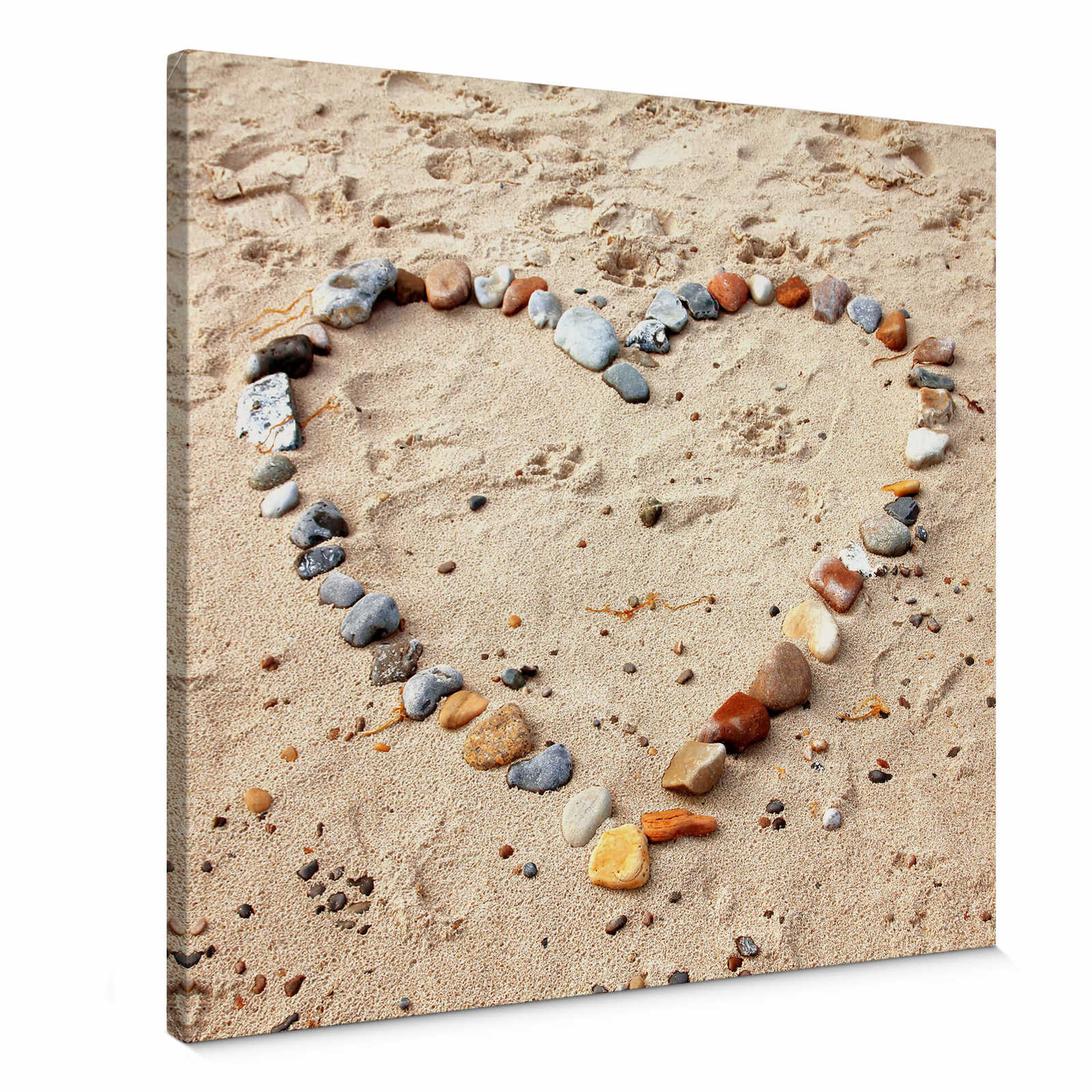 Square canvas print stones on the beach – beige
