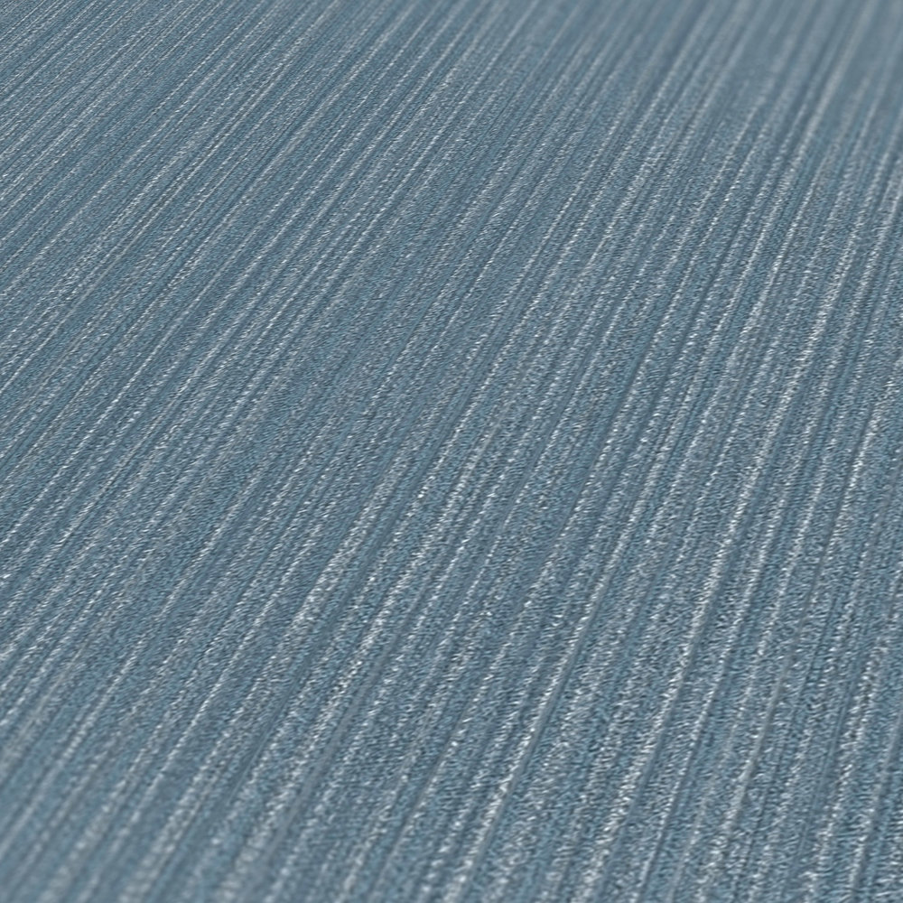             Plain wallpaper with grey-blue textile look - blue, metallic
        