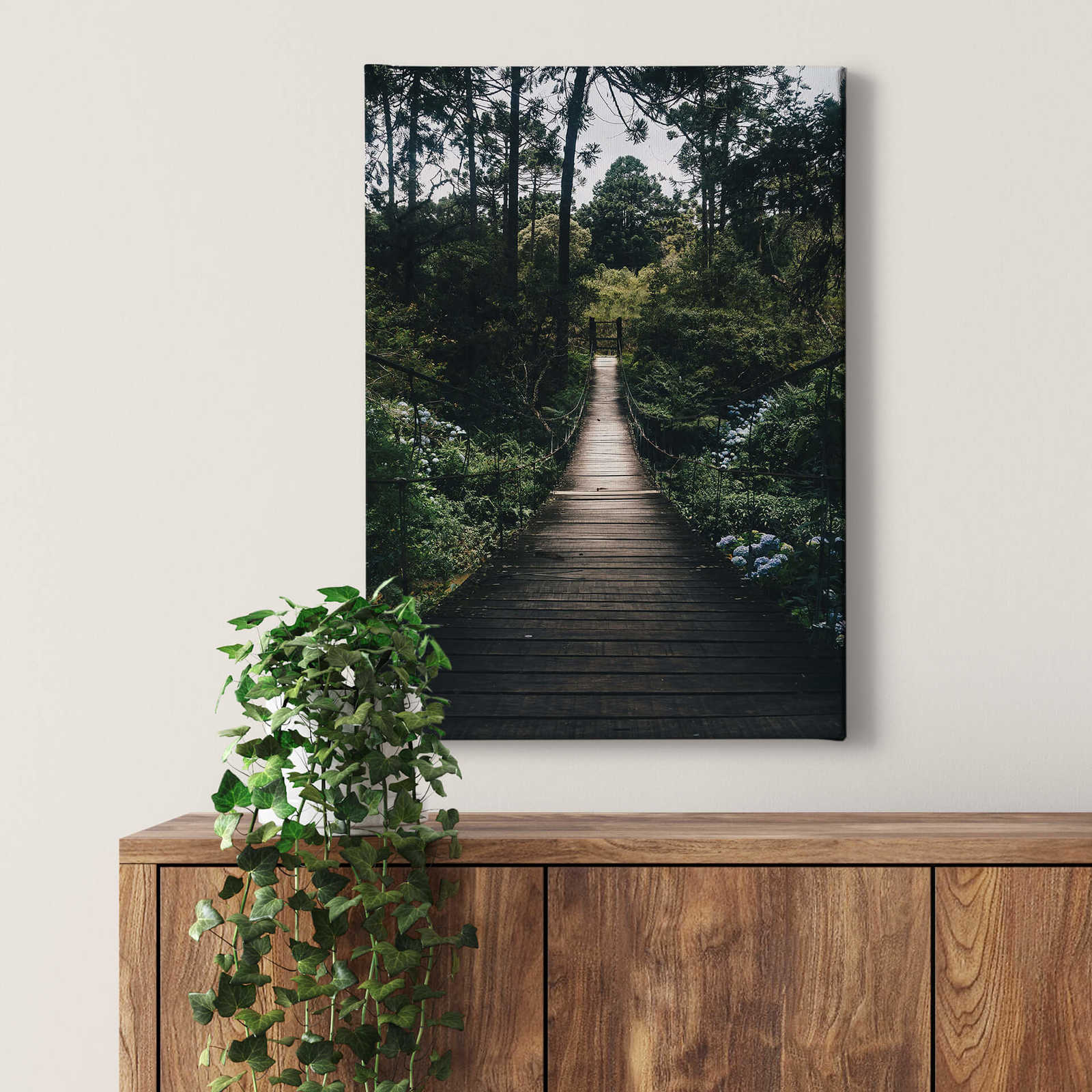             Canvas print suspension bridge in the forest – green
        