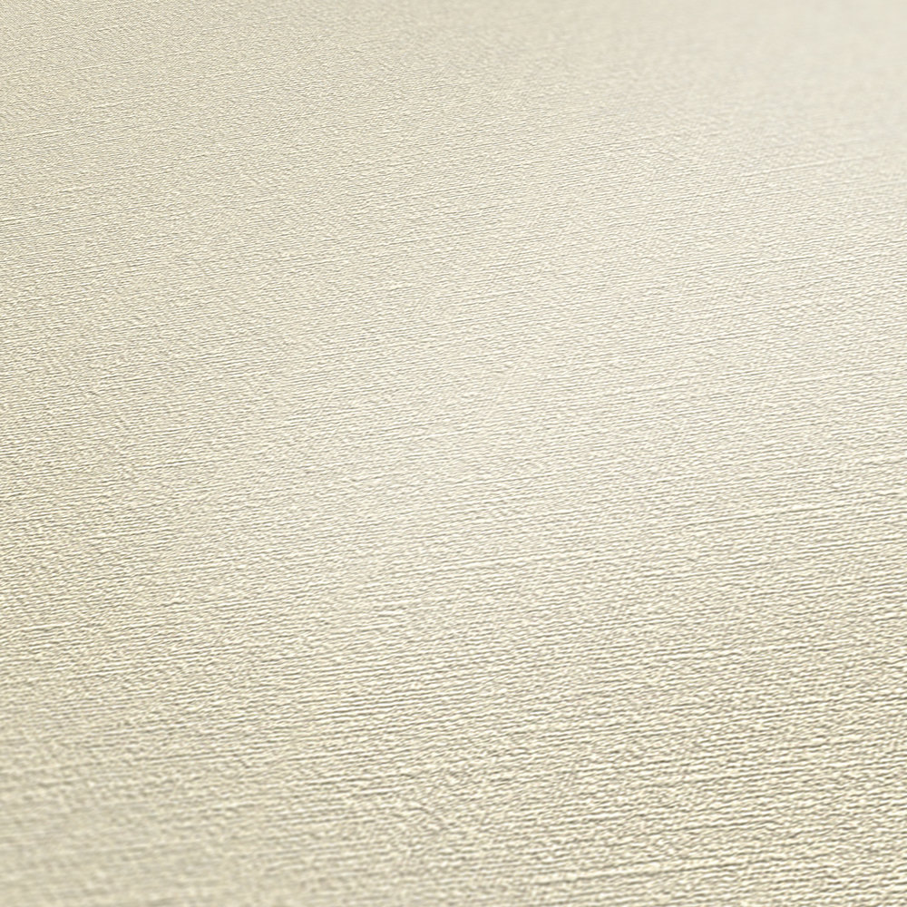             Papier peint beige uni & mat avec motifs structurés
        