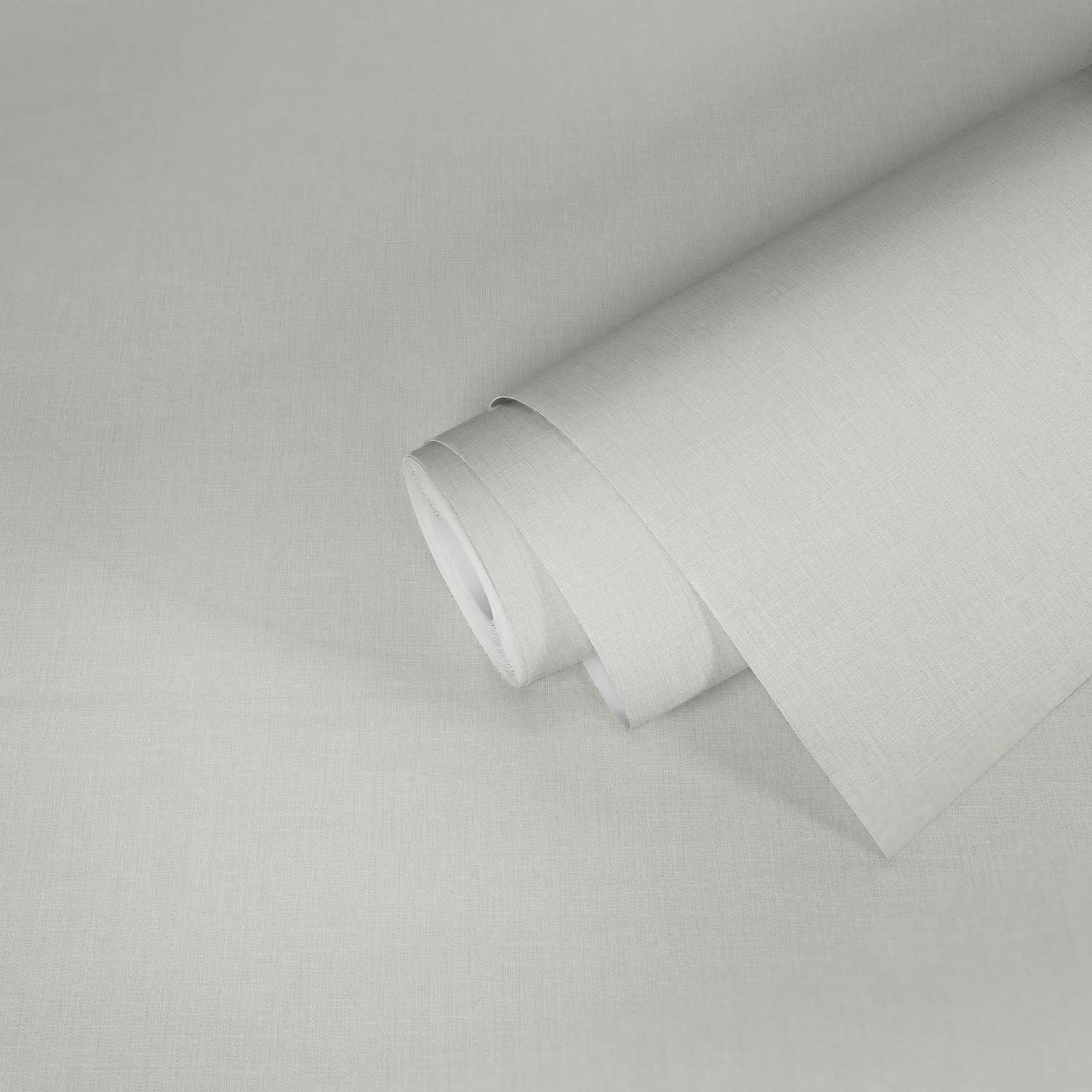             Papier peint blanc crème uni avec structure textile dans le style maison de campagne
        