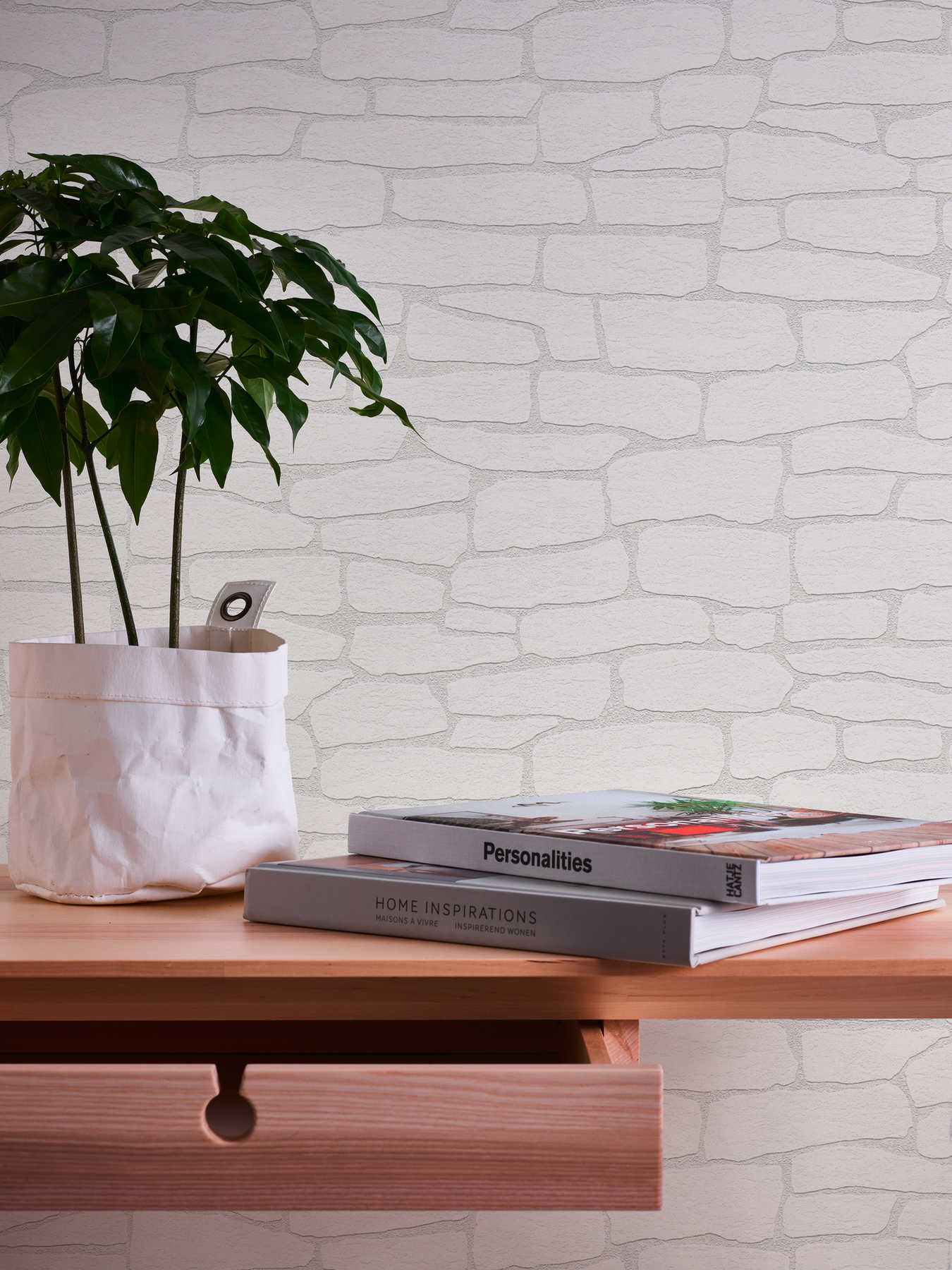             Paintable non-woven wallpaper with 3D stone look
        