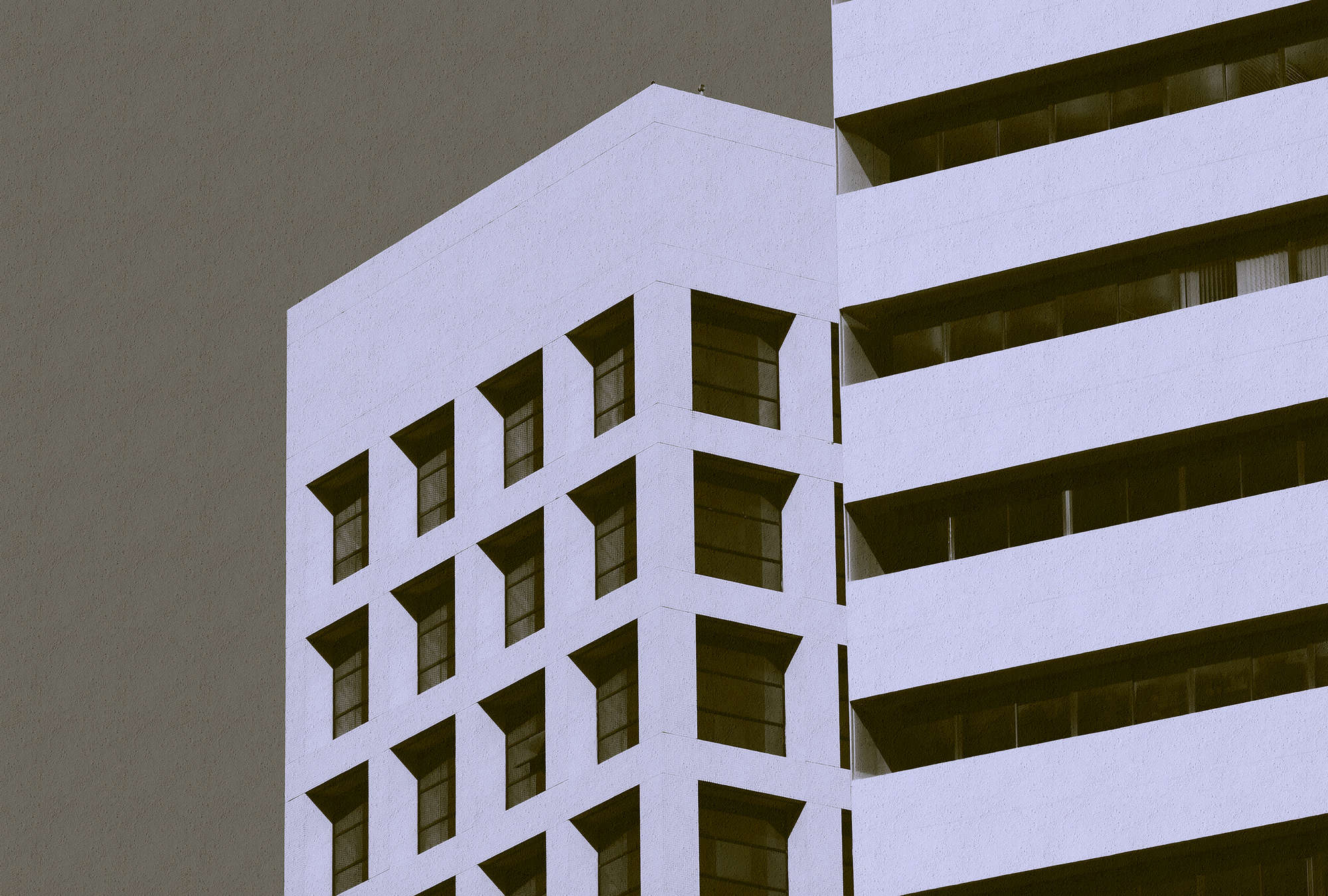             Skyscraper 1 - Photo wallpaper with building in retro look in Raupuz structure - Black, Taupe | Structure non-woven
        