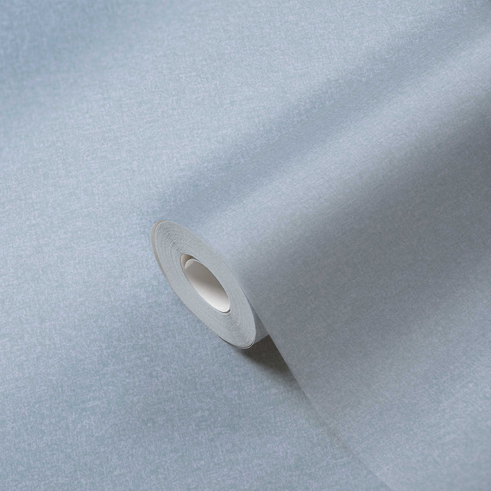             Non-woven wallpaper with textured pattern plain - light blue
        