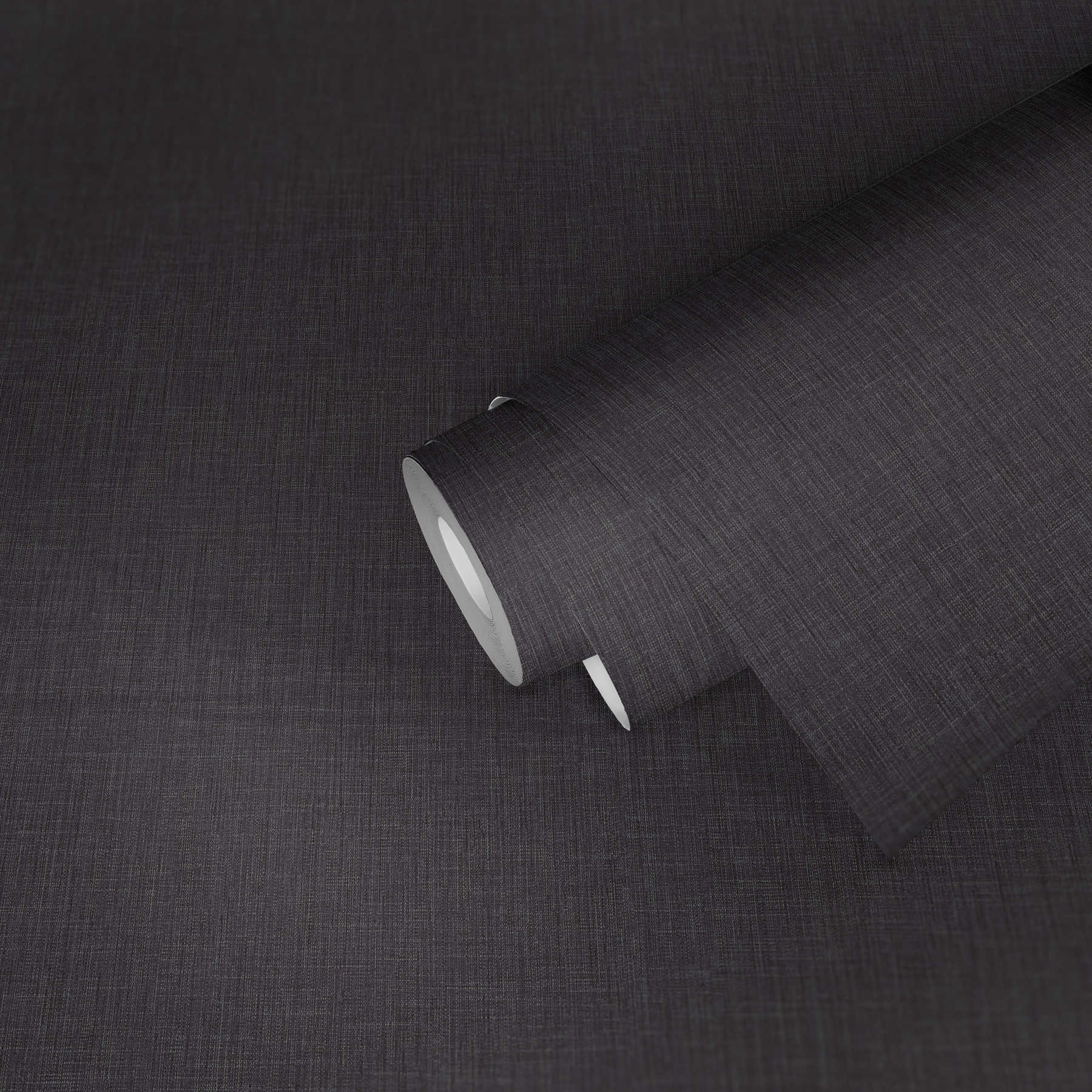             Effen behangpapier met textielstructuur - zwart
        
