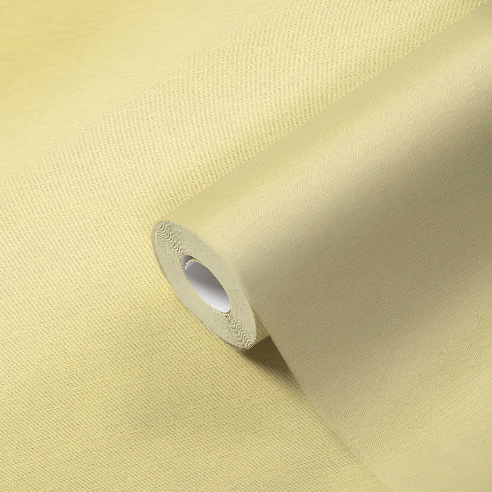             Papier peint pastel jaune uni avec structure textile
        