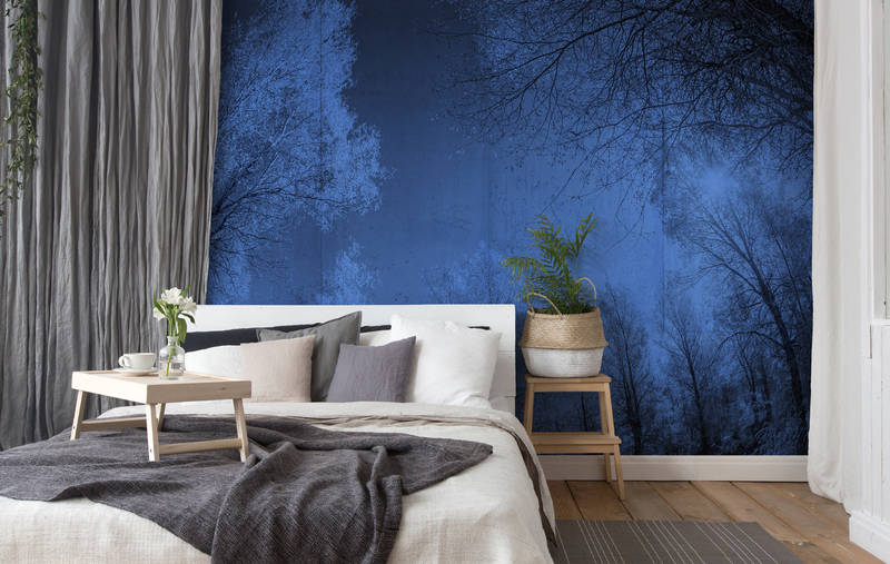             Papier peint panoramique imitation béton & paysage forestier - bleu, noir
        