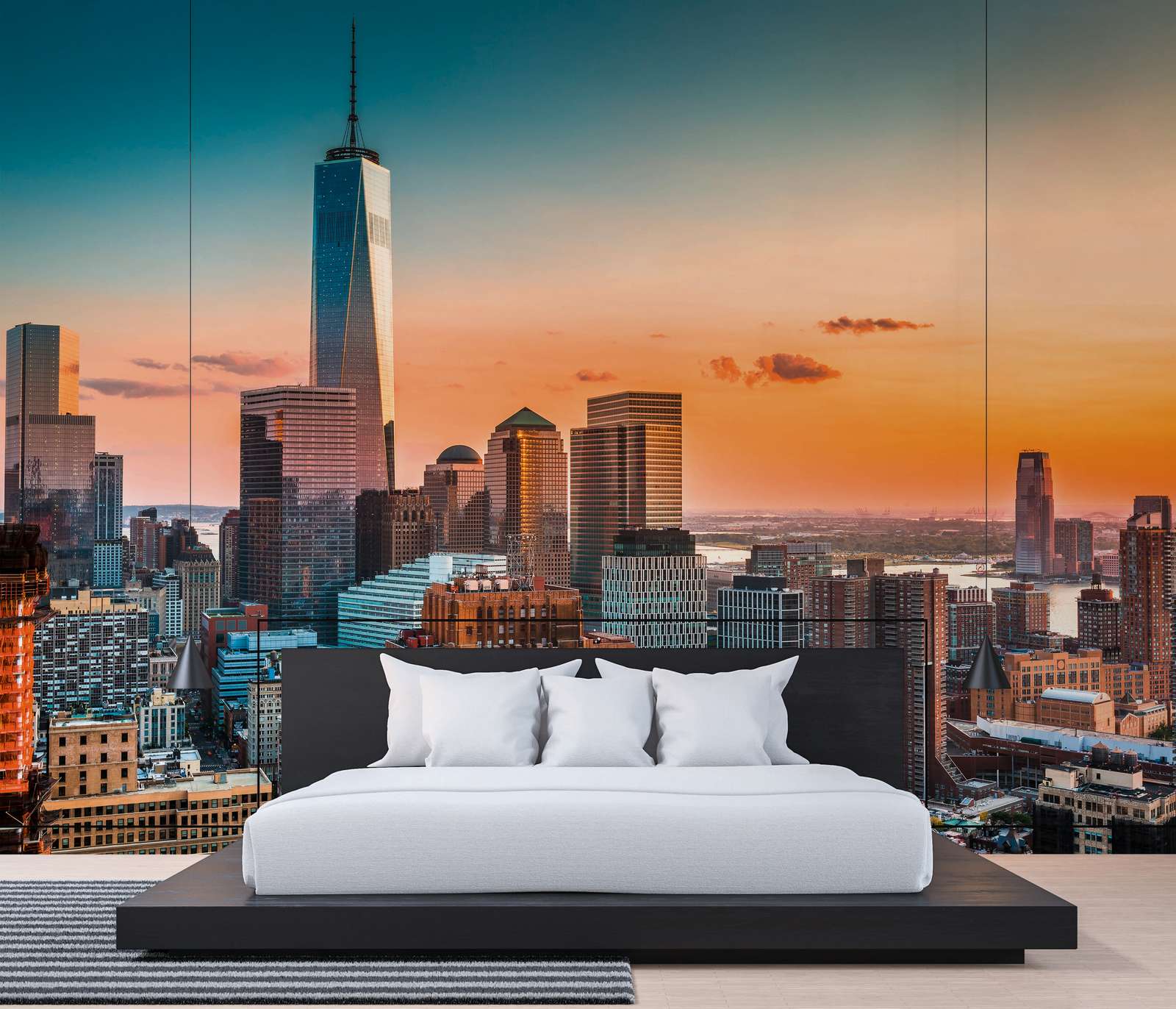             Papier peint panoramique avec l'horizon de Manhattan au coucher du soleil - jaune, multicolore
        