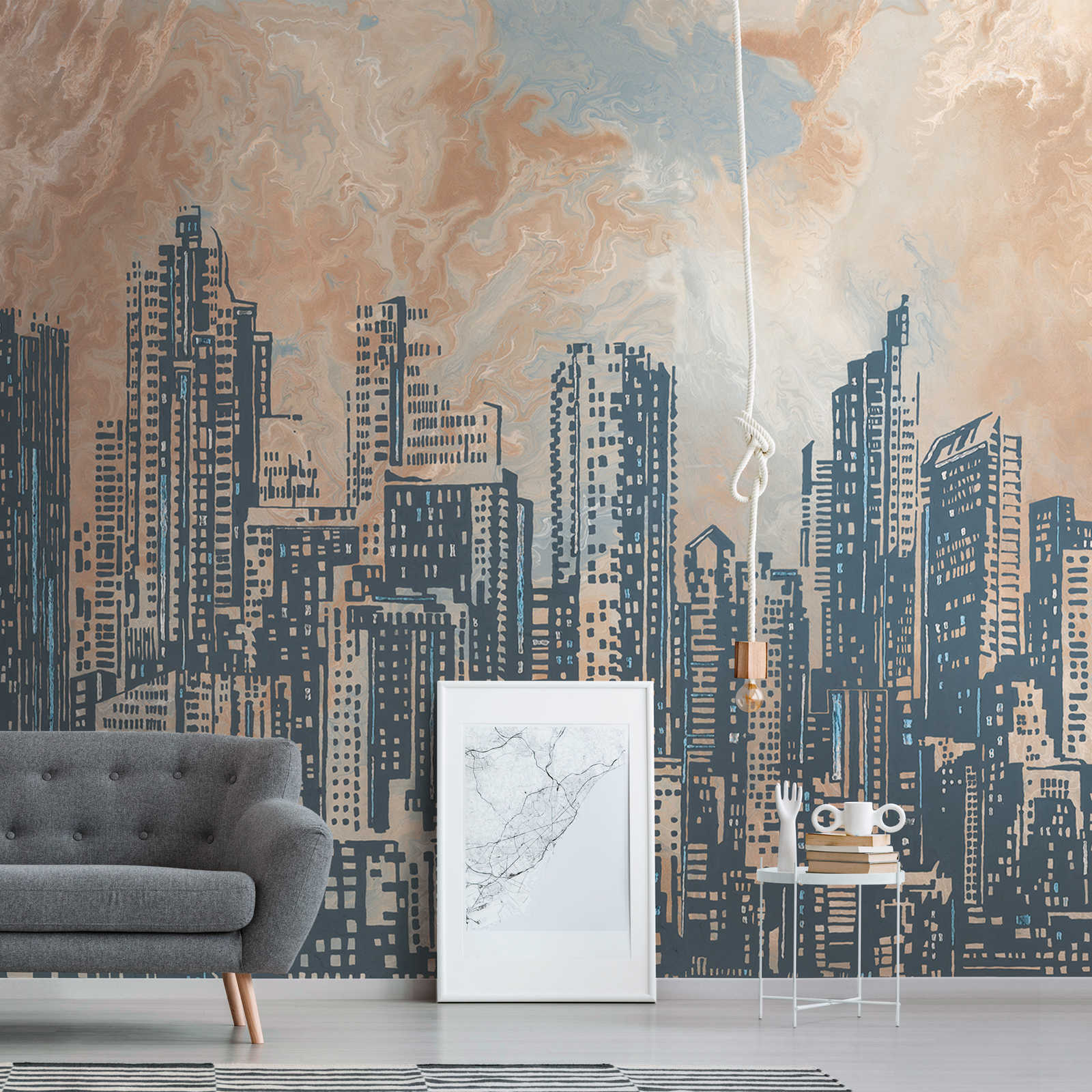 Papier peint intissé Skyline de la ville au crépuscule - orange, gris, bleu
