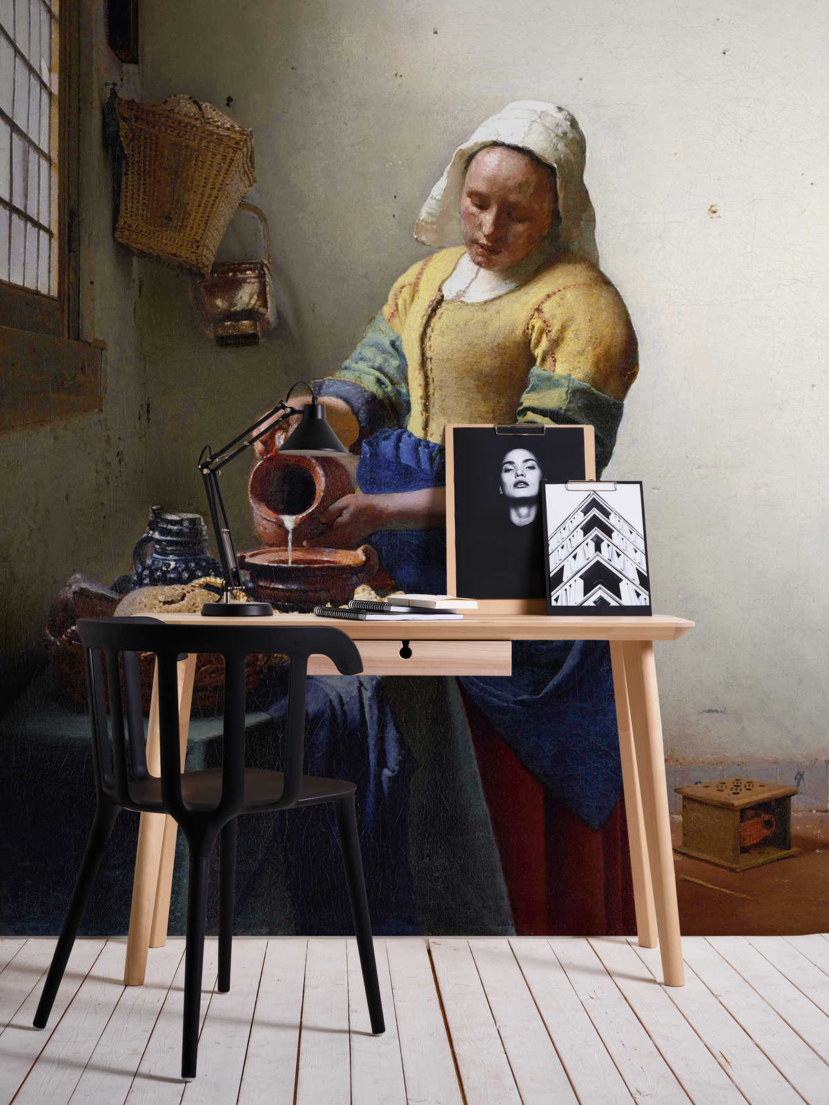             Maid with milk jug mural by Jan Vermeer
        
