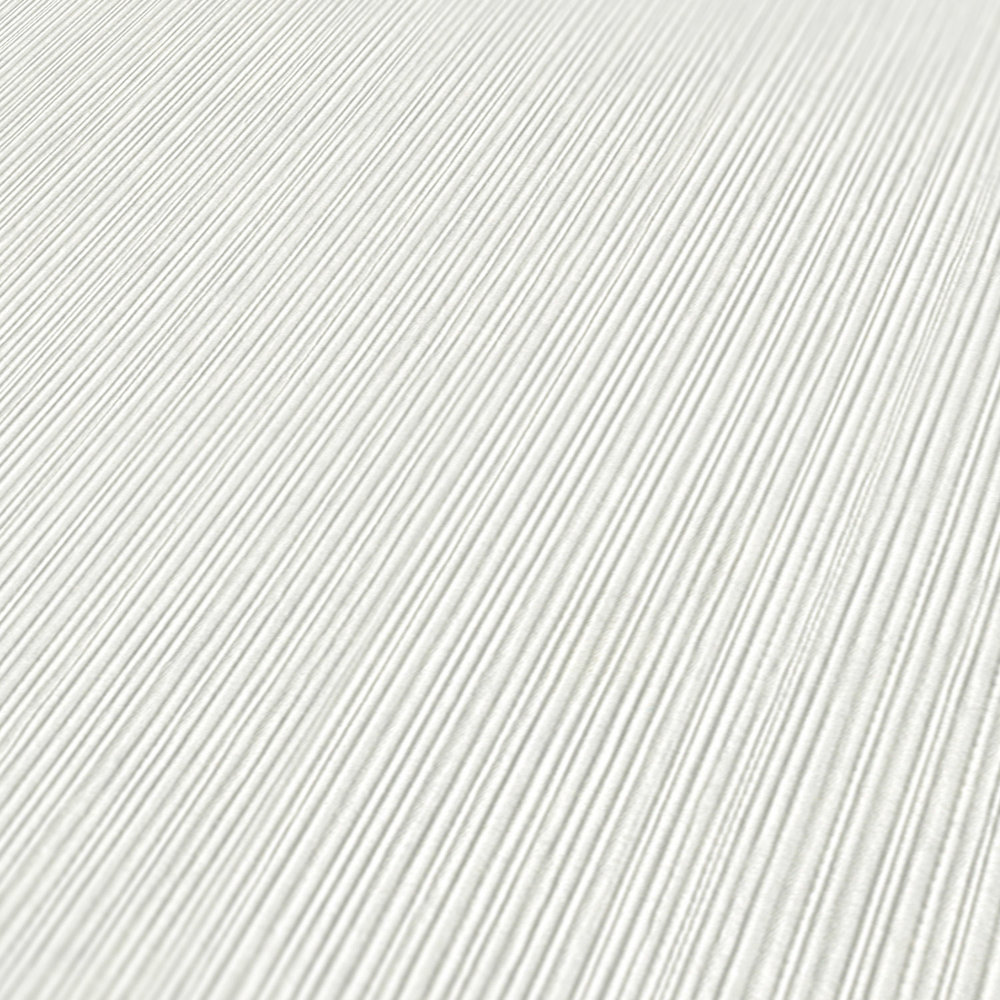             White wallpaper with lined texture pattern
        