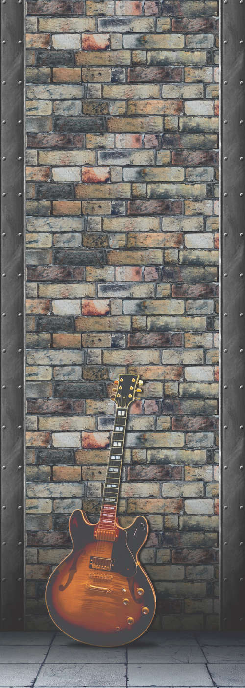             Mural moderno de guitarra frente a la pared de piedra sobre tejido no tejido con textura
        